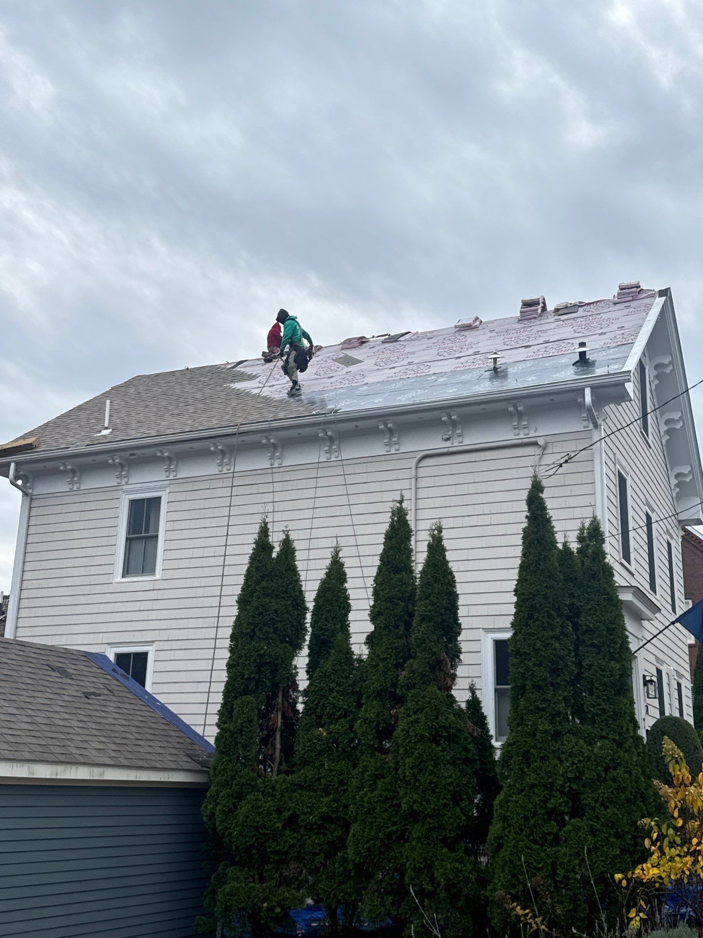 Newburyport Complete Roof Replacement with Solar Venting Skylight by Mighty Dog Roofing of Greater Middlesex County
