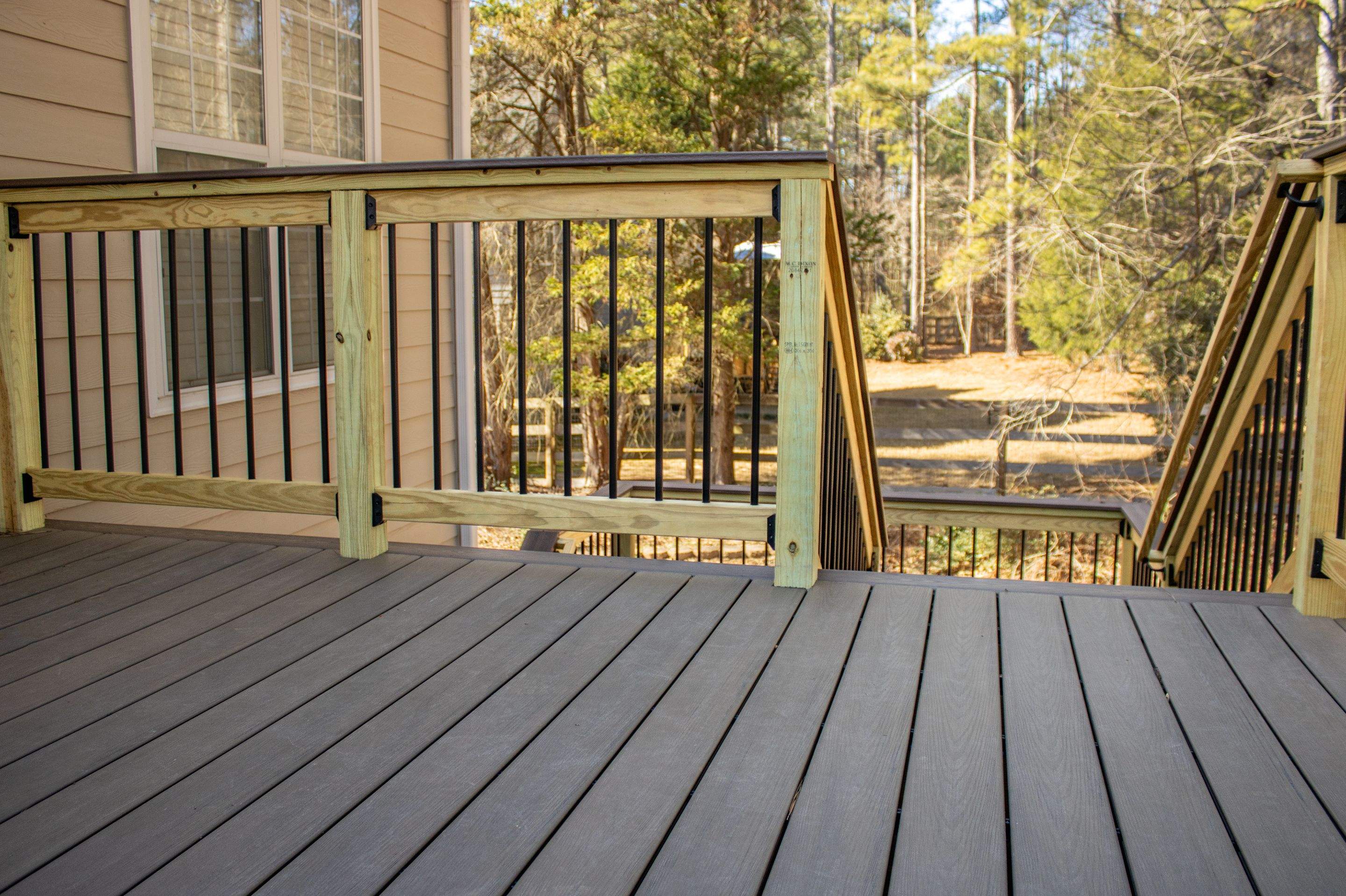 Deck Build using Deckorators Venture Series Decking in the Sandbar Color by Nelson Exteriors