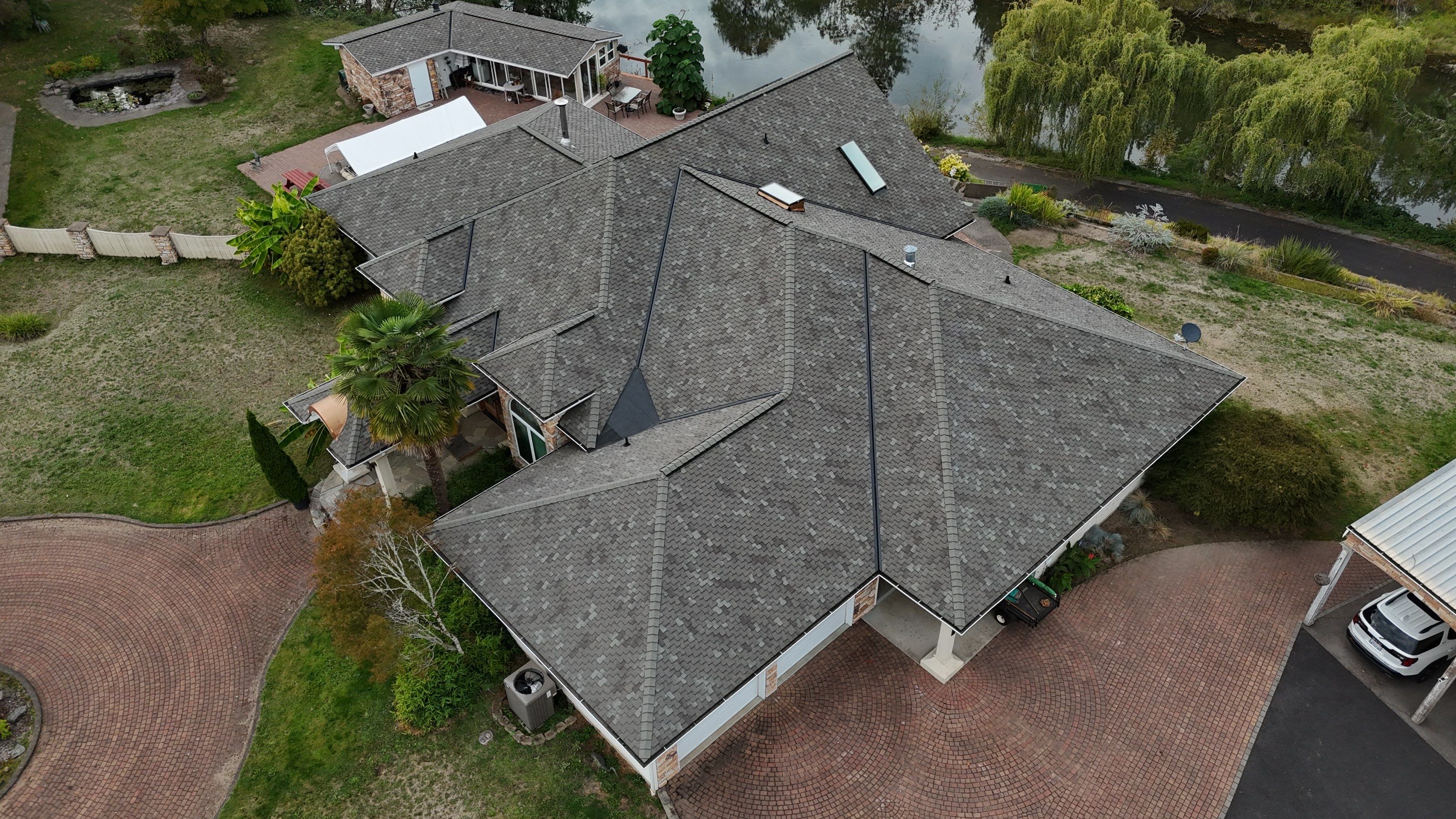 Sycamore Presidential OC | Roof Replacement in Woodland 98674 by Valiant Roofing, LLC