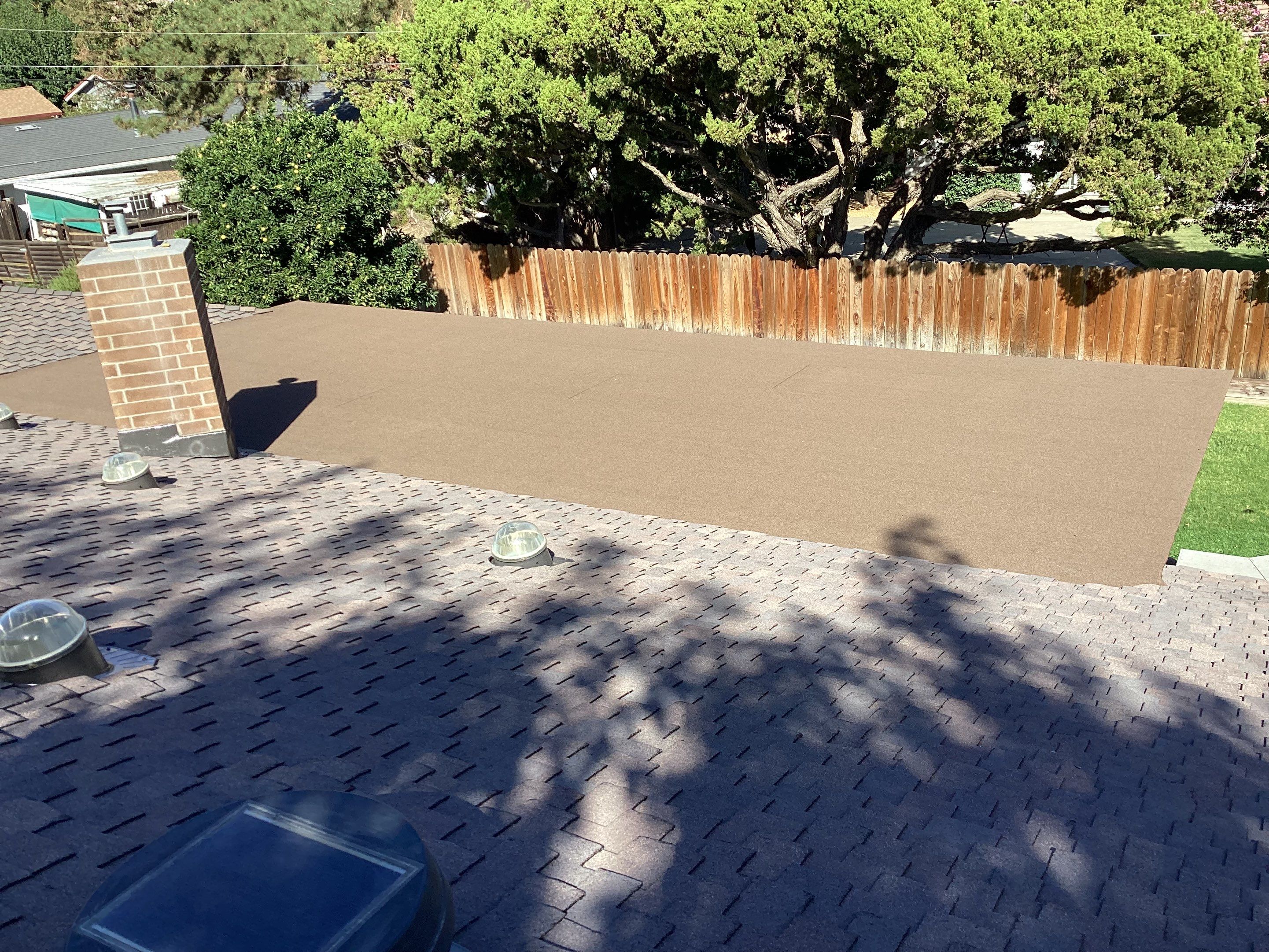 Installation of Certainteed Presidential shingles on residential house by Straight Edge Roofing Inc