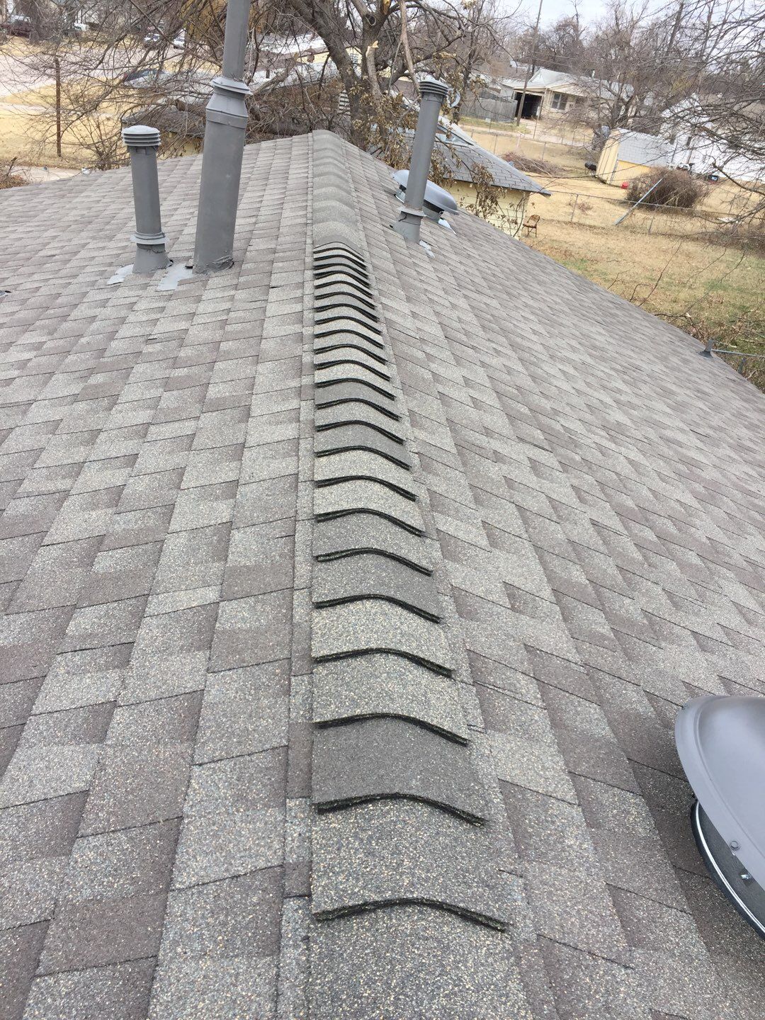 vent stack & solar tube in Warr Acres by McCann's Roofing and Construction