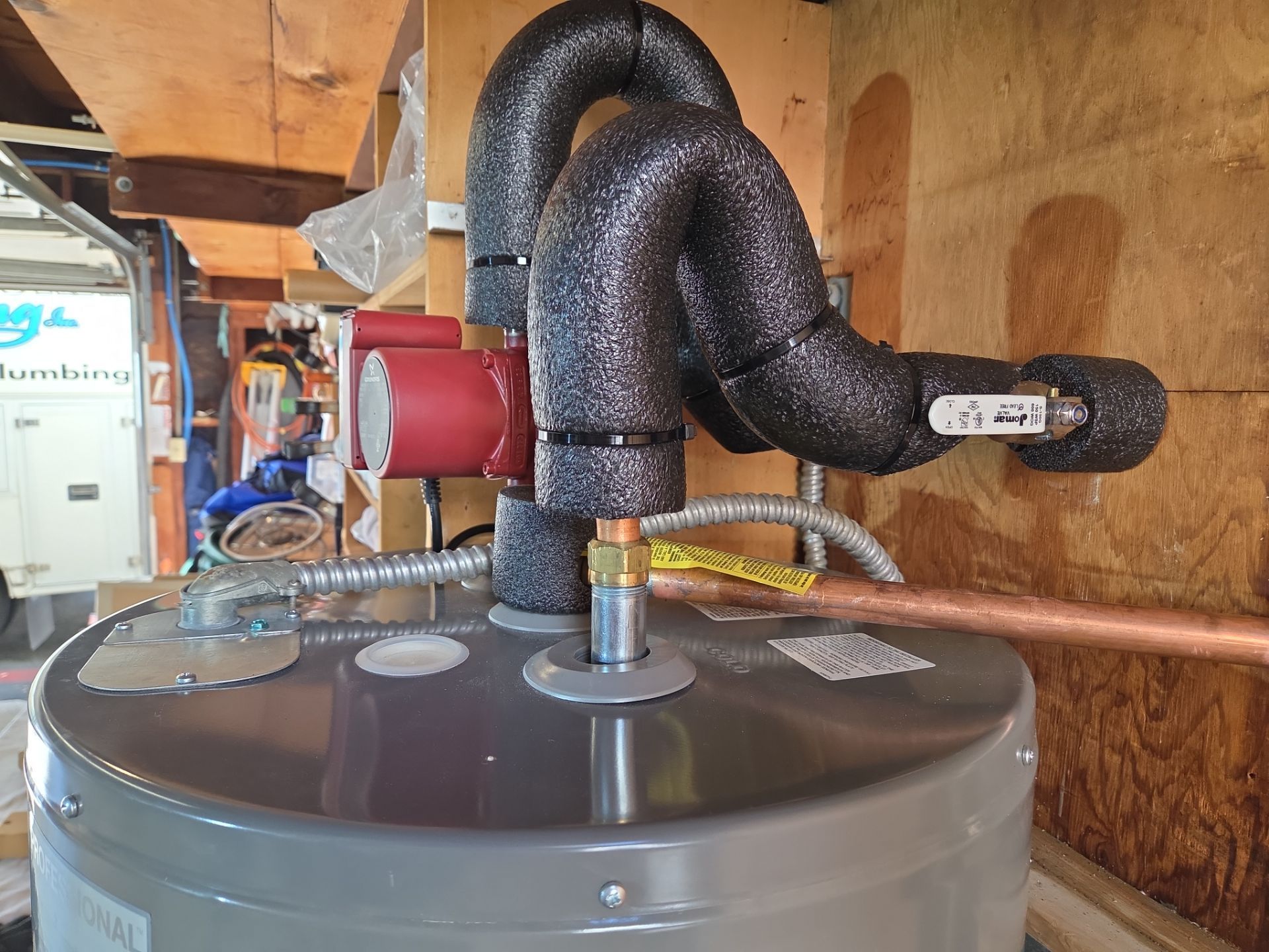 New Electric Water Heater by Professional Plumbing Inc 