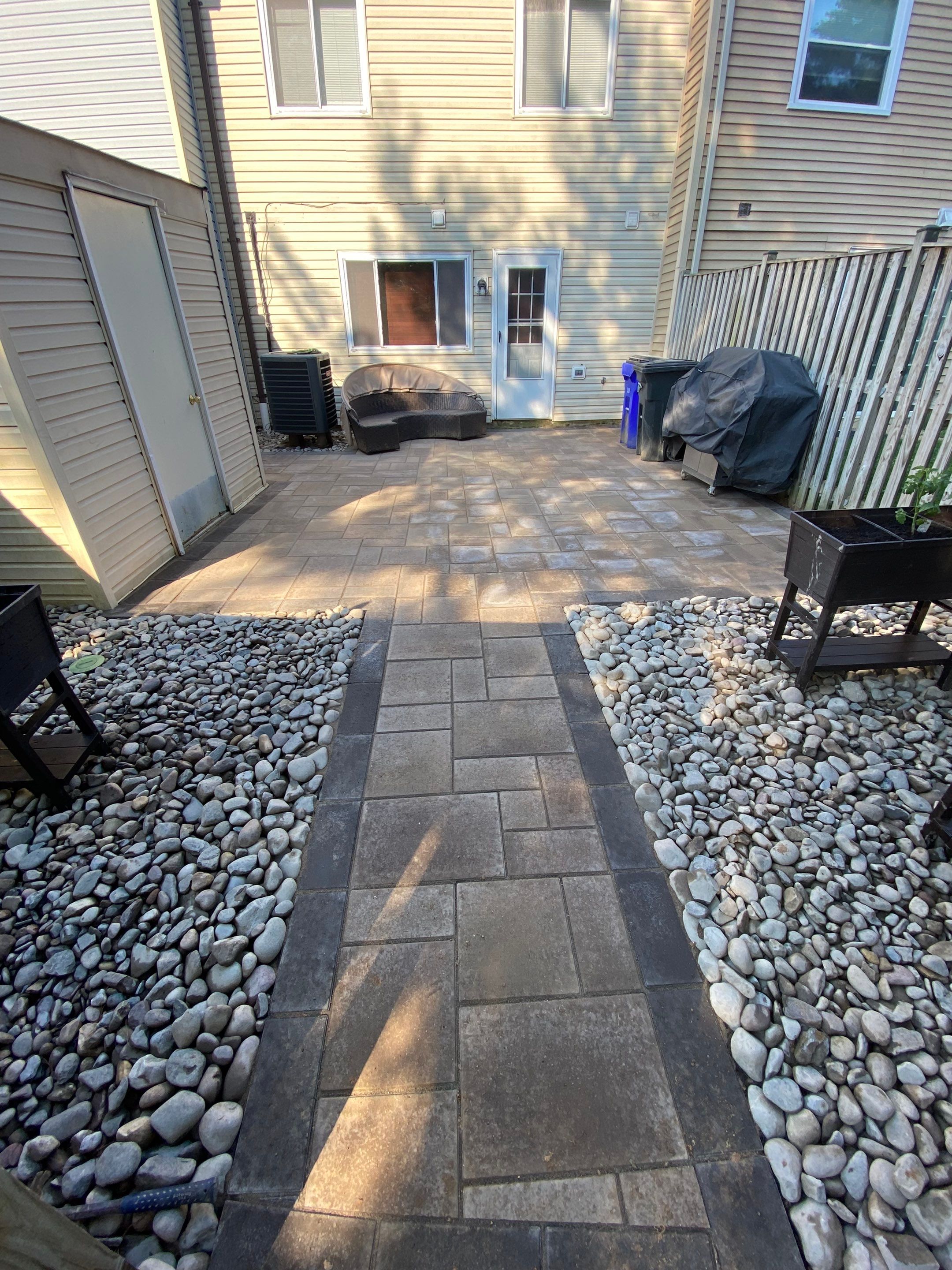 Backyard Transformation using Techo-Bloc Pavers by The Smet Companies, LLC
