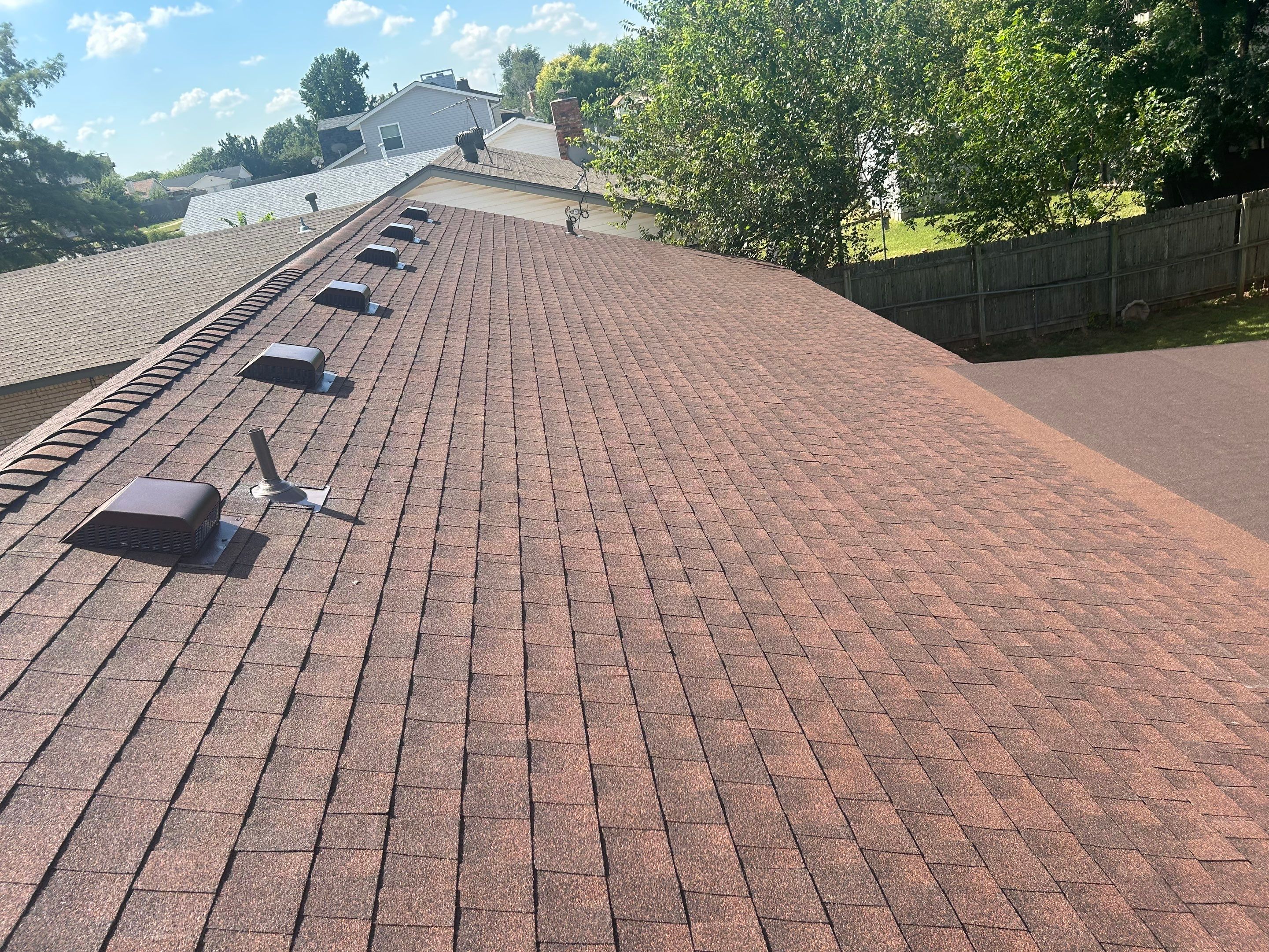 Roof Replacement and Gutter Installation in Oklahoma City, OK by McCann's Roofing and Construction