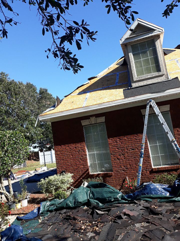 Residential Roofing Installation using Roof Replacement by American Roofing & Construction LLC