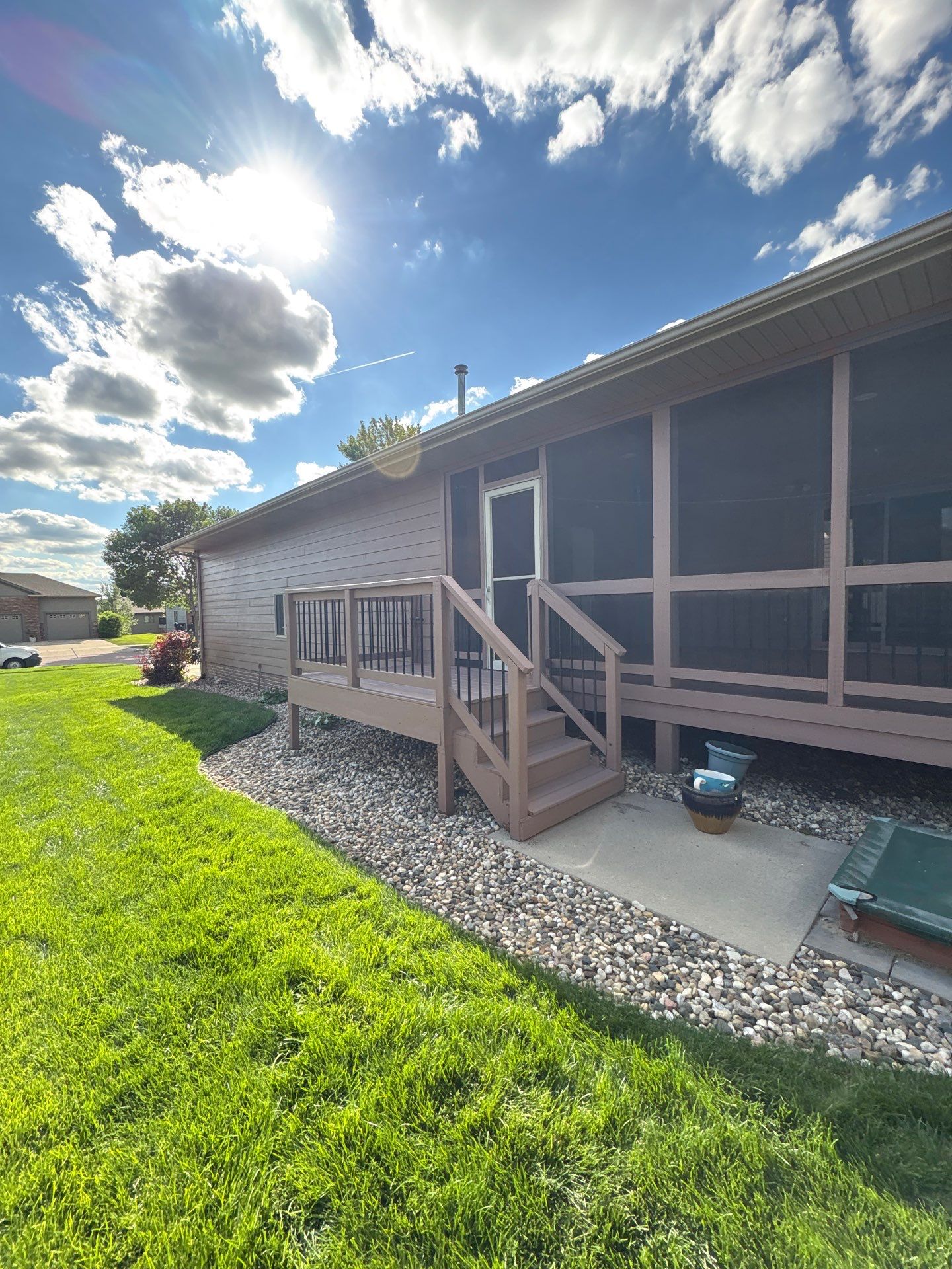 Exterior Painting and Wooden Deck Staining in Sioux Falls by Select Painting, Coatings & Garage Cabinets