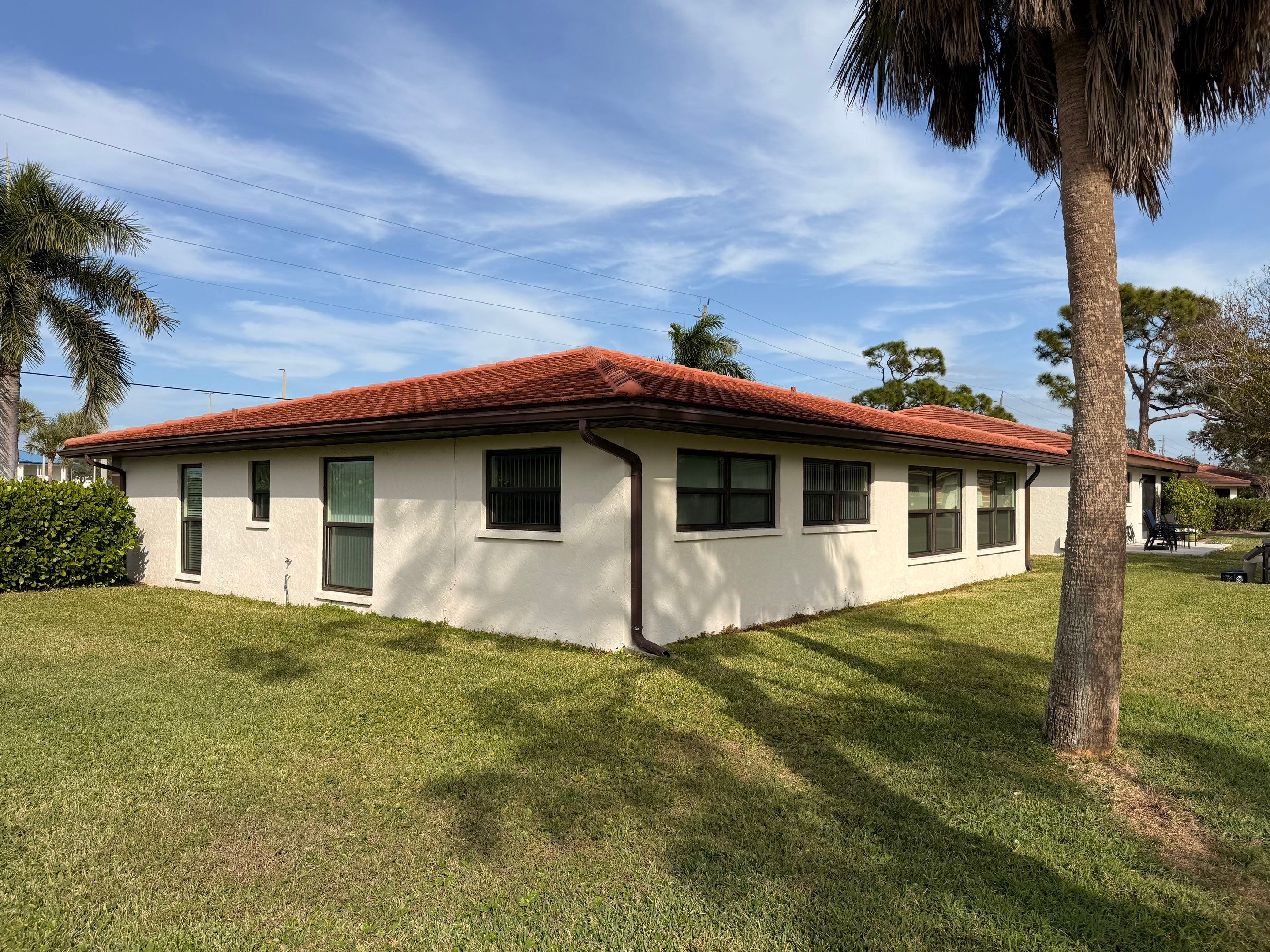 Neighboring Tile Roof Cleanings in Vivienda at Bradenton I – Bradenton, FL by Sunshine AquaWash