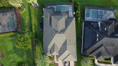 Ponte Vedra Residential Roof Replacement with Driftwood Architectural Asphalt Shingles by Trinity Restoration and Roofing LLC