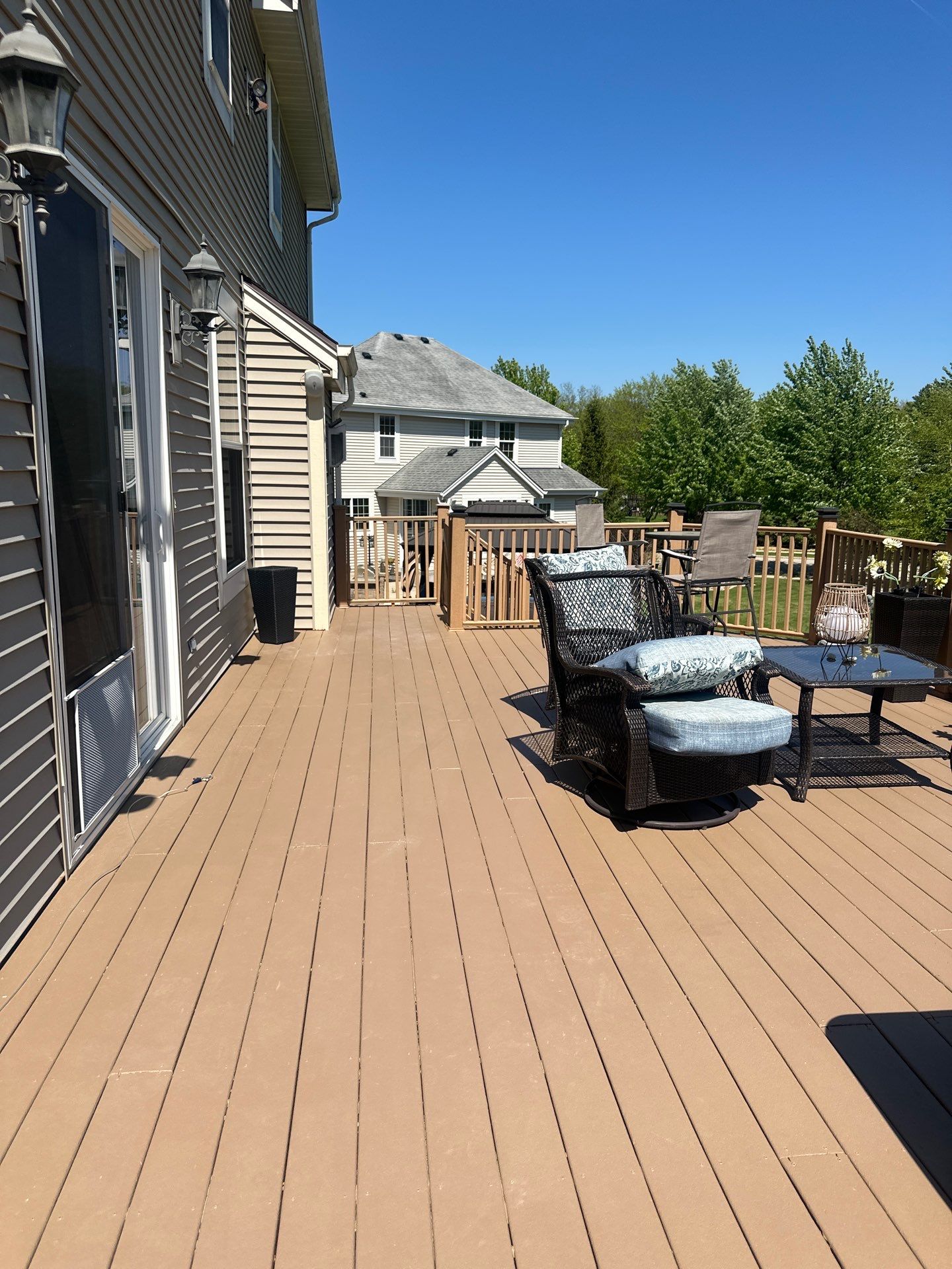 Elevated Wood Deck Refinishing and Railing Restoration in Waukesha by OCS Contracting Services