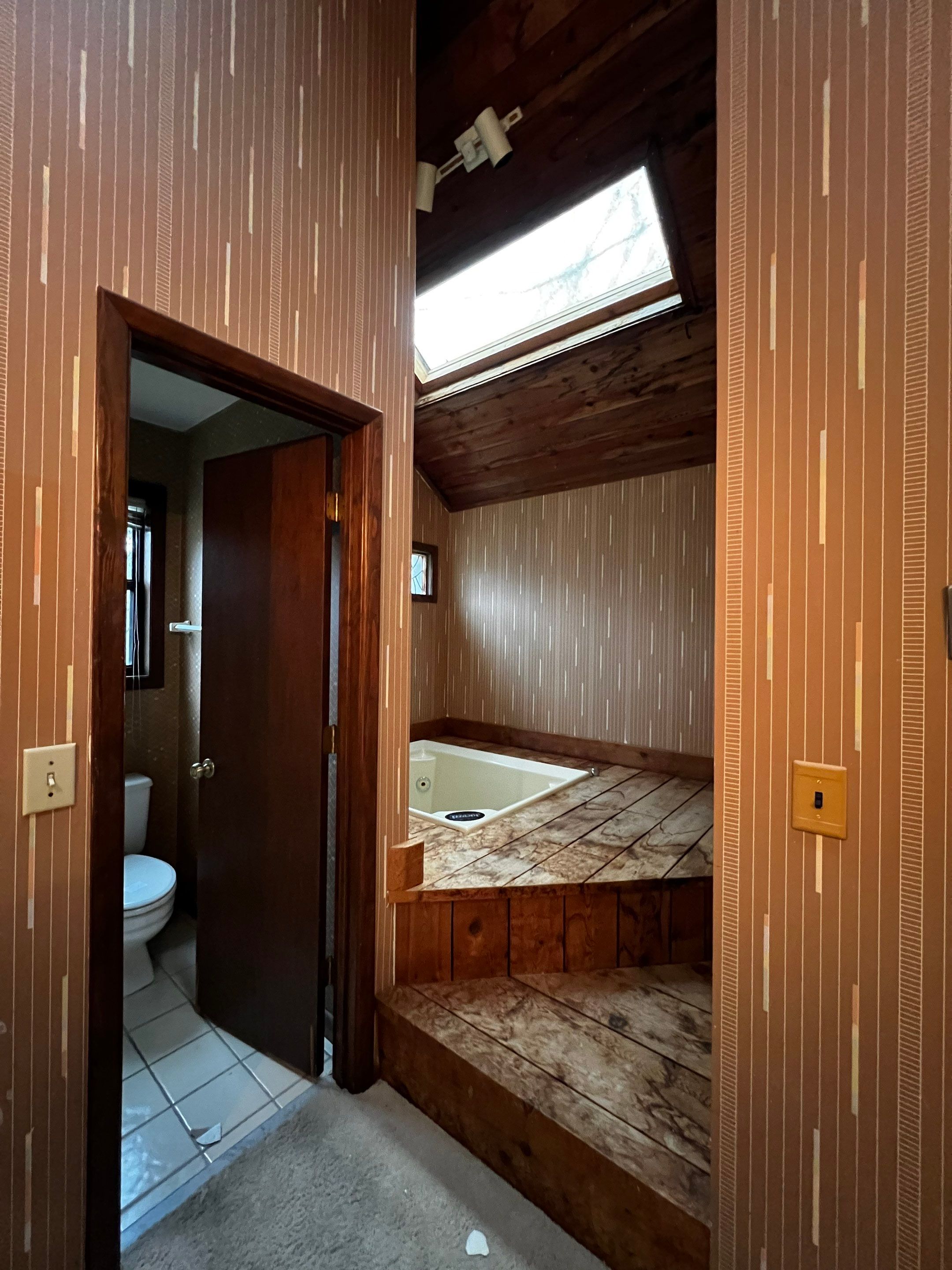 Modern Marietta Home Transformation with Custom Kitchen and Vertical Siding by Swift Home Renovations