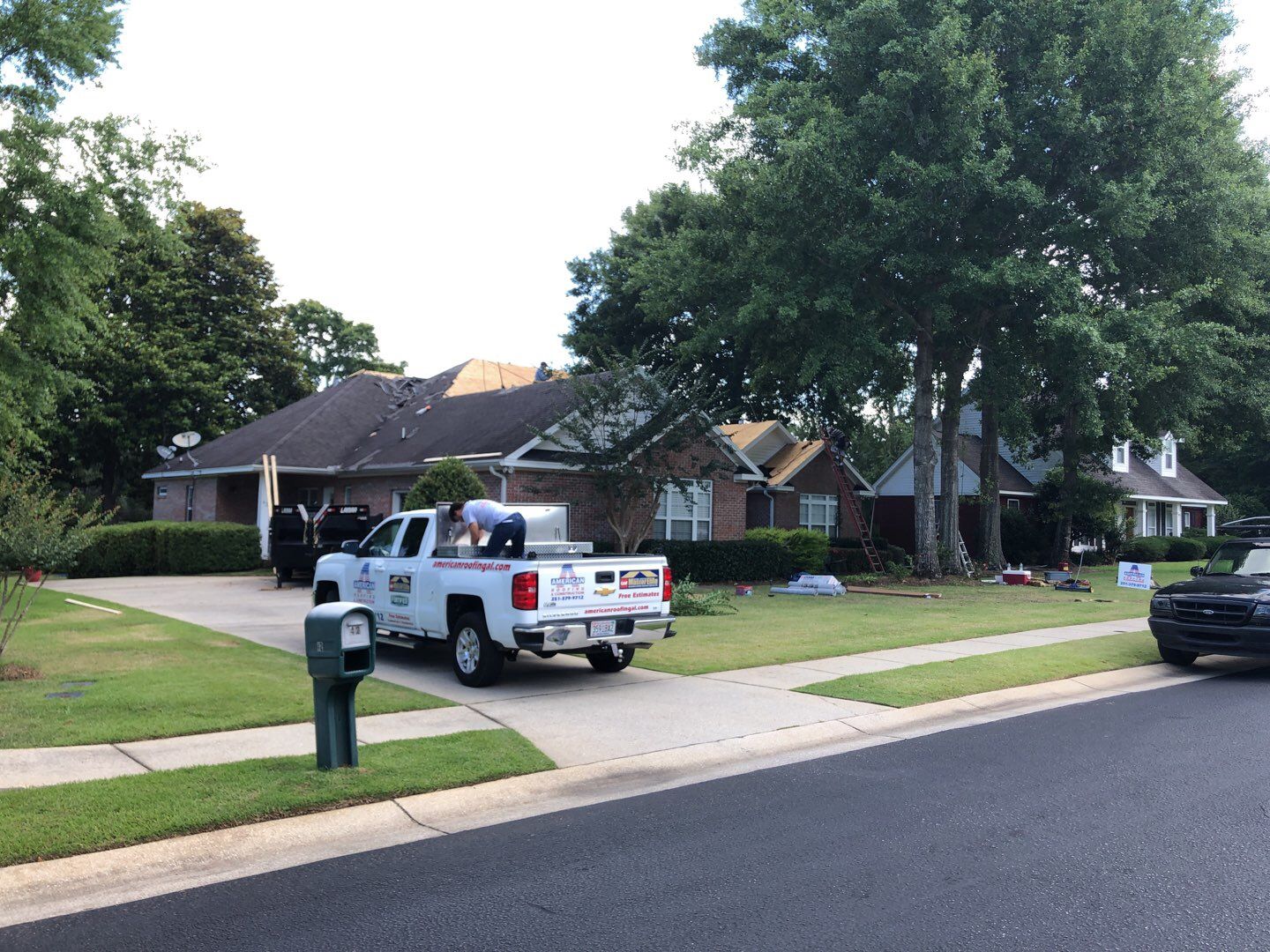 Residential Roofing Installation using Roof Replacement by American Roofing & Construction LLC