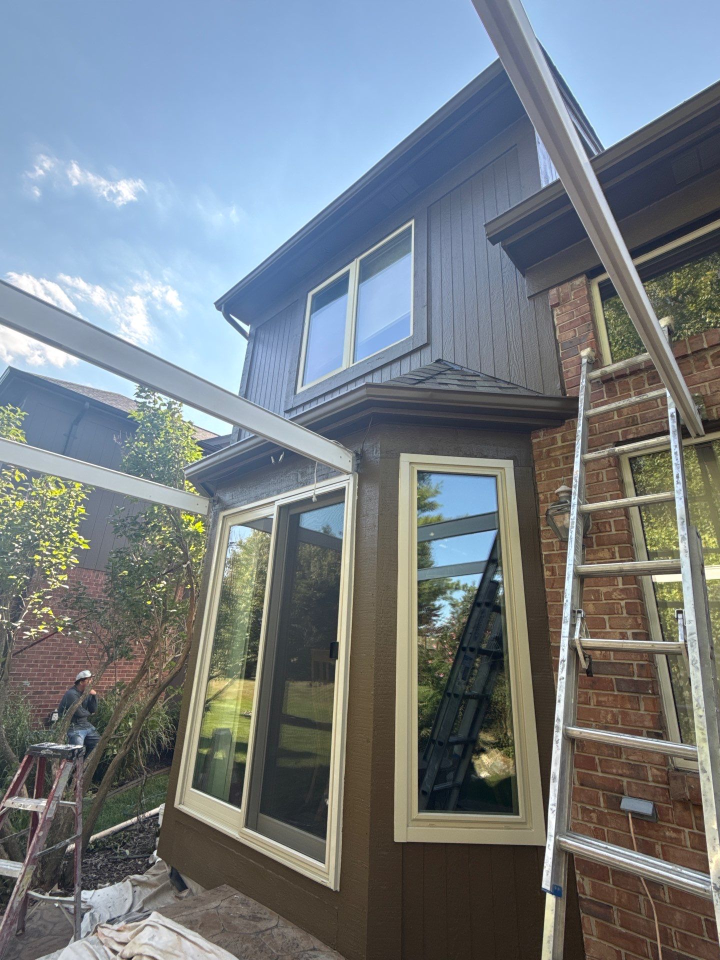 Siding and Wood Trim Repair for Washington Residential Property by Top Shelf Painter