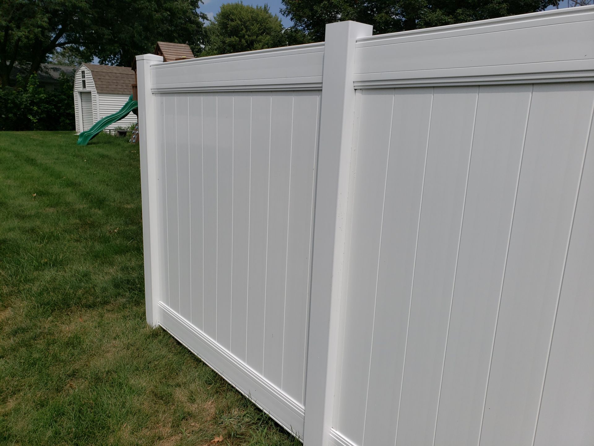 White Vinyl Privacy Fence Installation in Grundy Center by Perfect Picket Fence and Stain