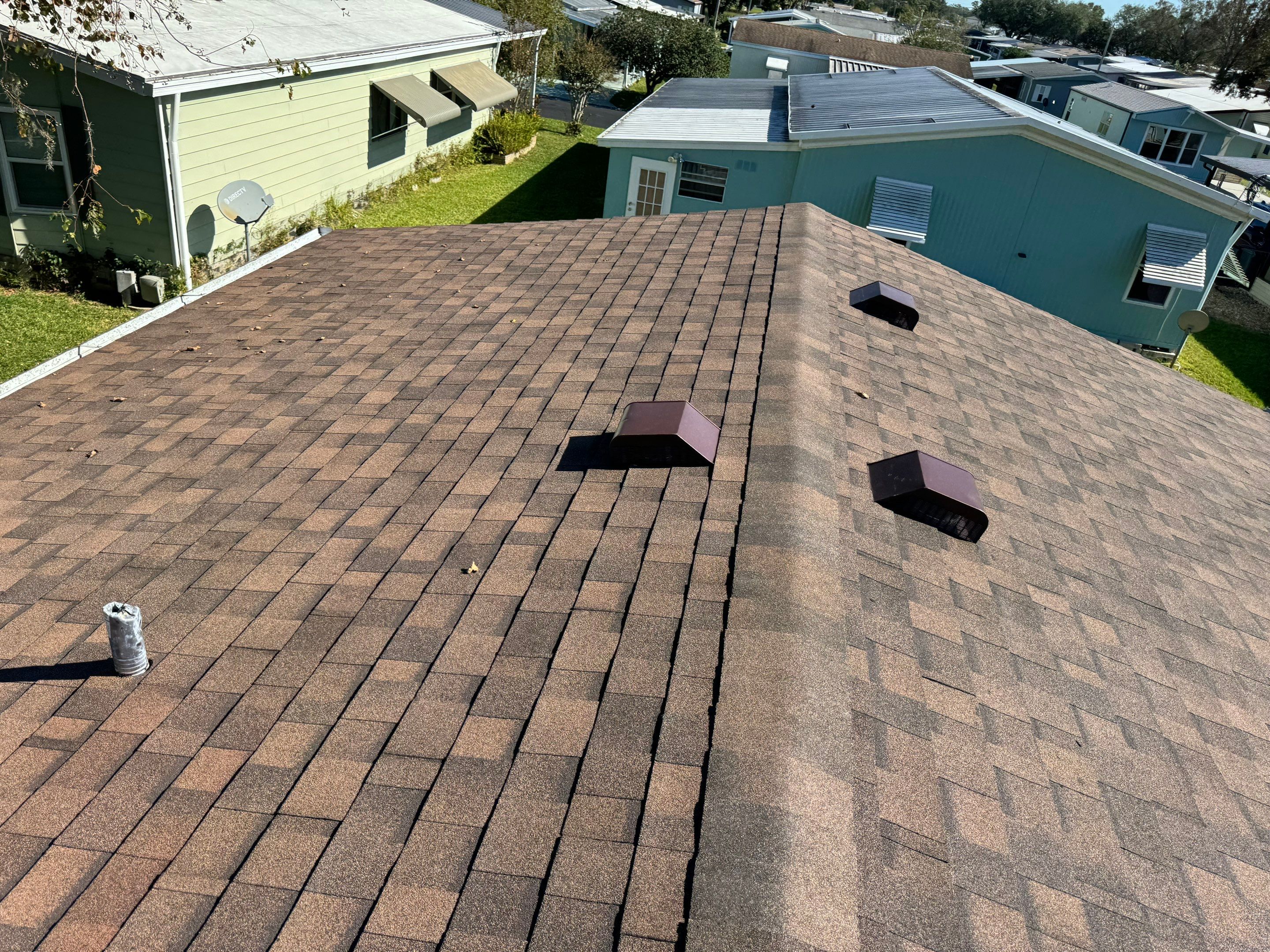 Brownwood Shingles by Reimagine Roofing