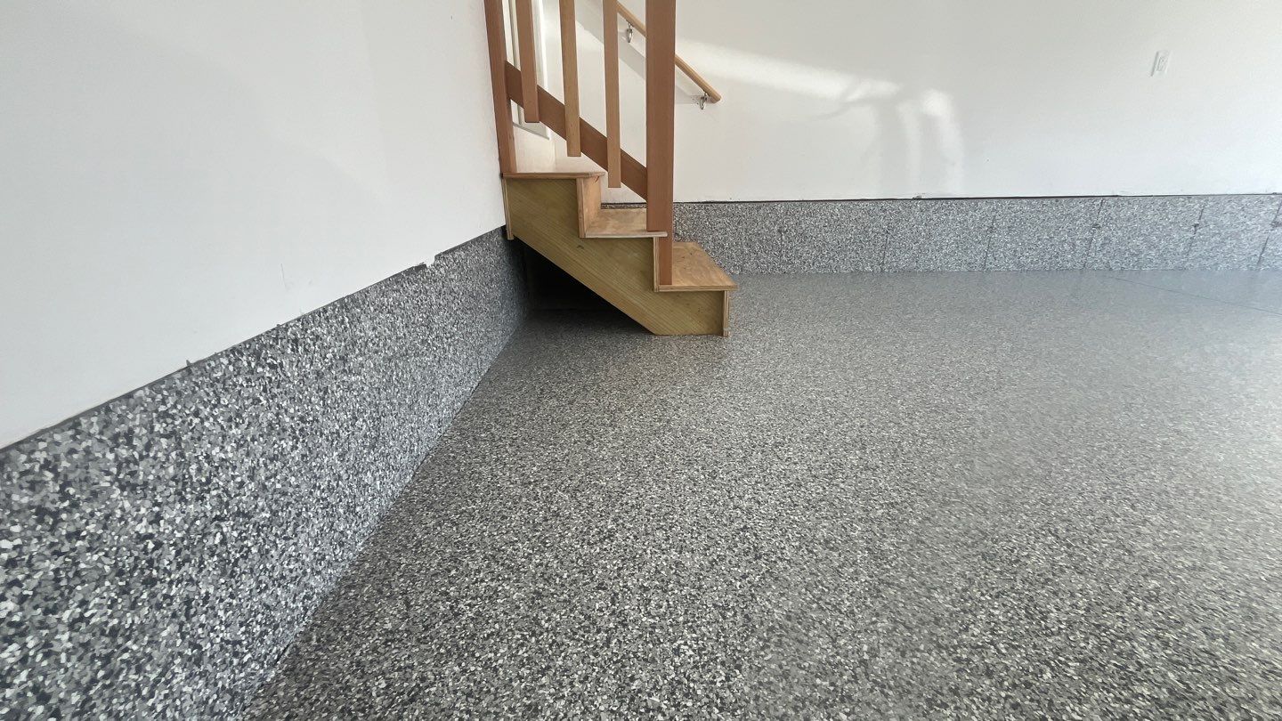 Garage in Londonderry, NH 03053 by Symphony Concrete Coatings
