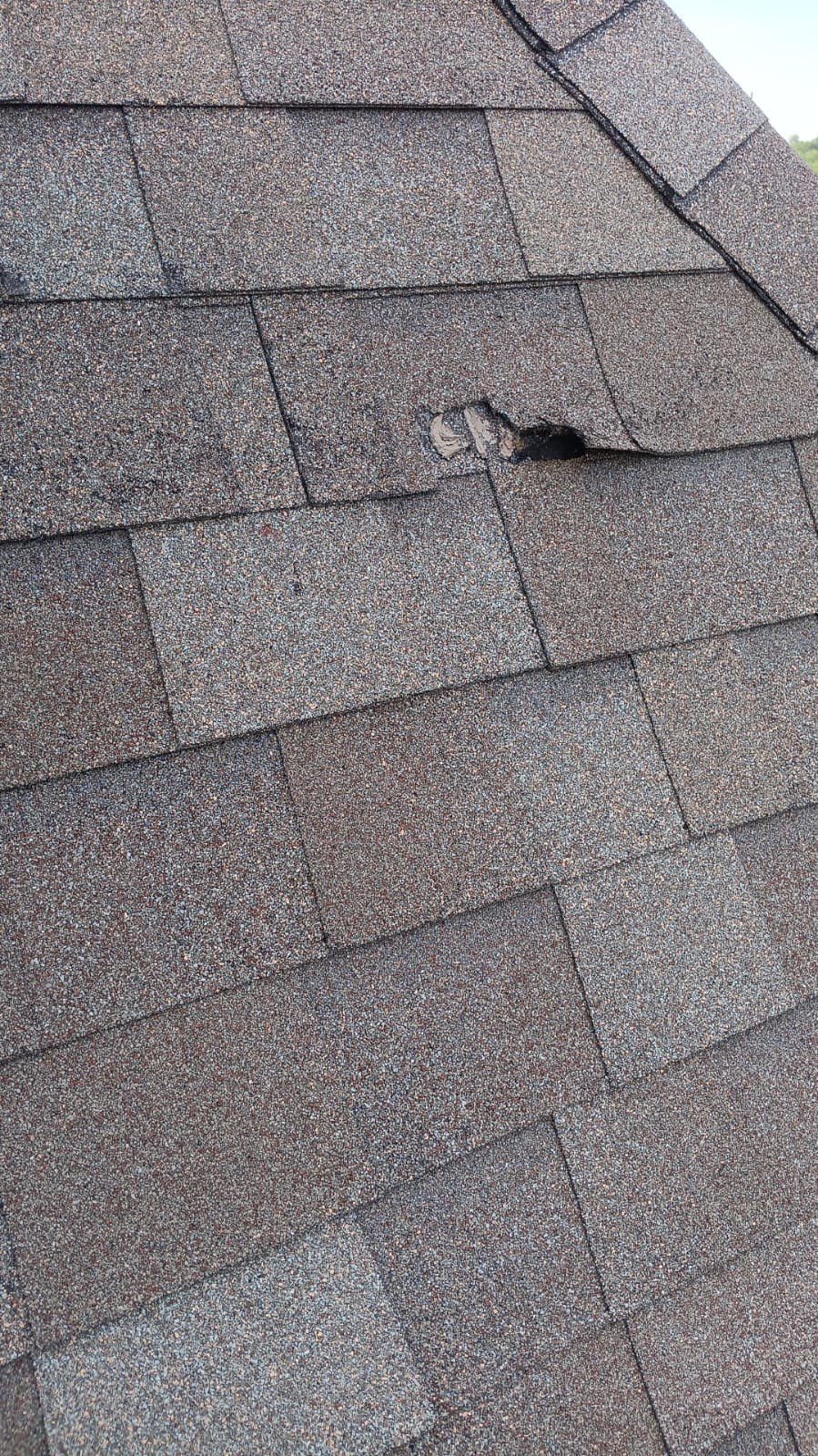 Hail Damage using Owen's Corning Duration (Lifetime) Shingles by Roof Repair Company