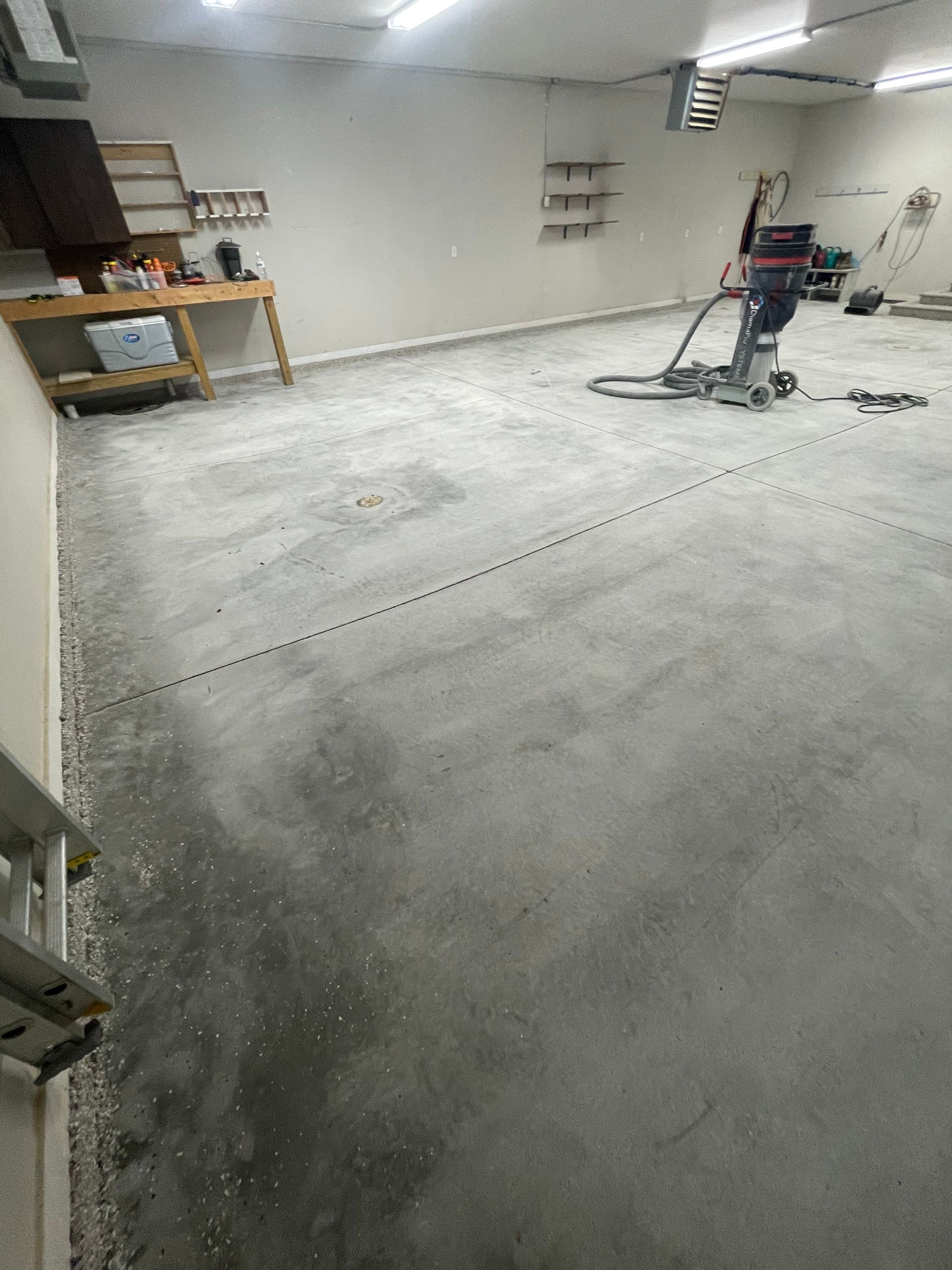 Grey Speckled Polyuera Garage Floor Coating for Hartford Three-Car Garage by Select Painting, Coatings & Garage Cabinets