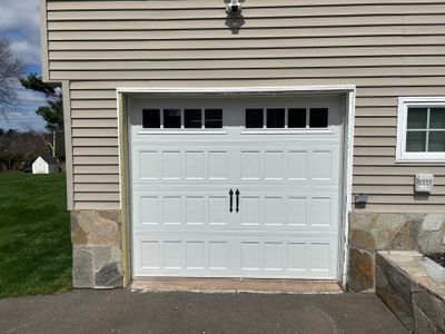 Classic Garage Door Upgrade with Refined Detail