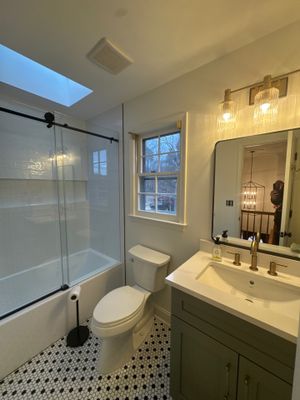 Smyrna Bathroom Remodel Featuring Sage Green Vanity and Hexagonal Tile