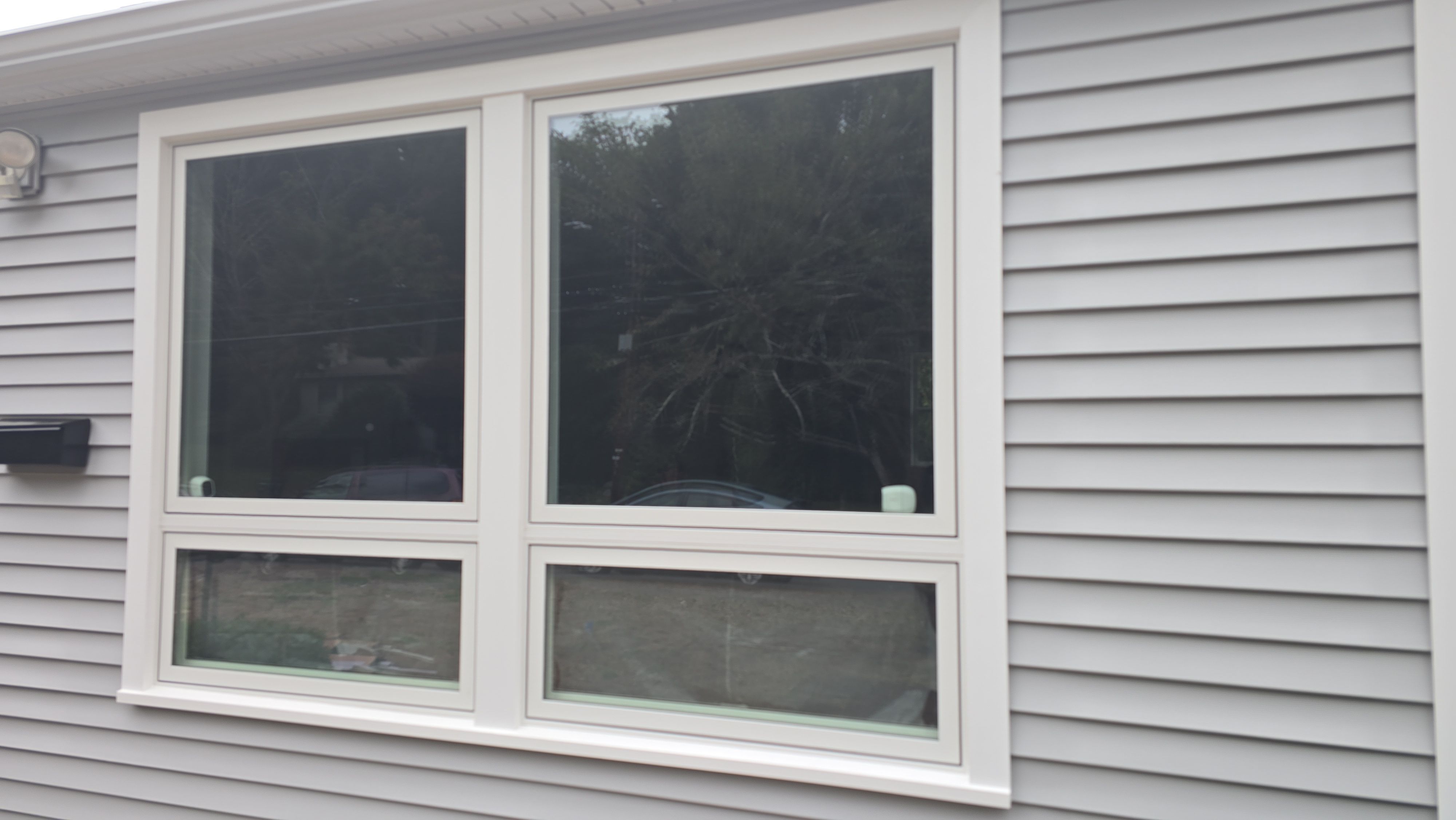 Complete exterior remodeling in NAtick, MA by UBrothers Construction