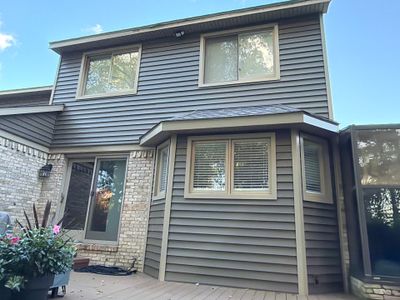 Siding Replacement using Alside D5" Flagship Brown