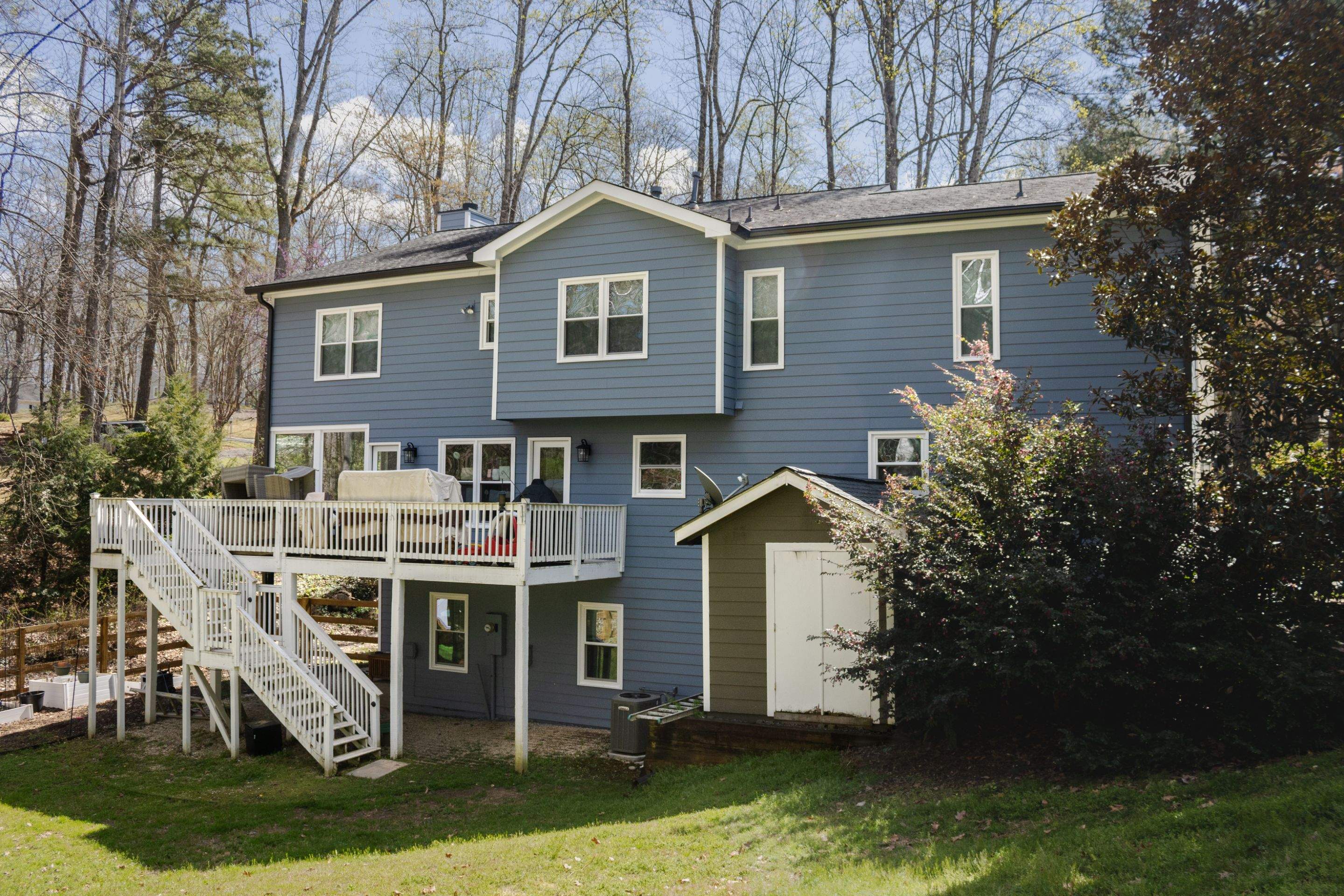 Marietta, GA Full Siding Replacement, 30+ Window Replacements, Screened-In Porch to Sunroom Conversion, Gutter Replacement, and Exterior Painting by Nelson Exteriors