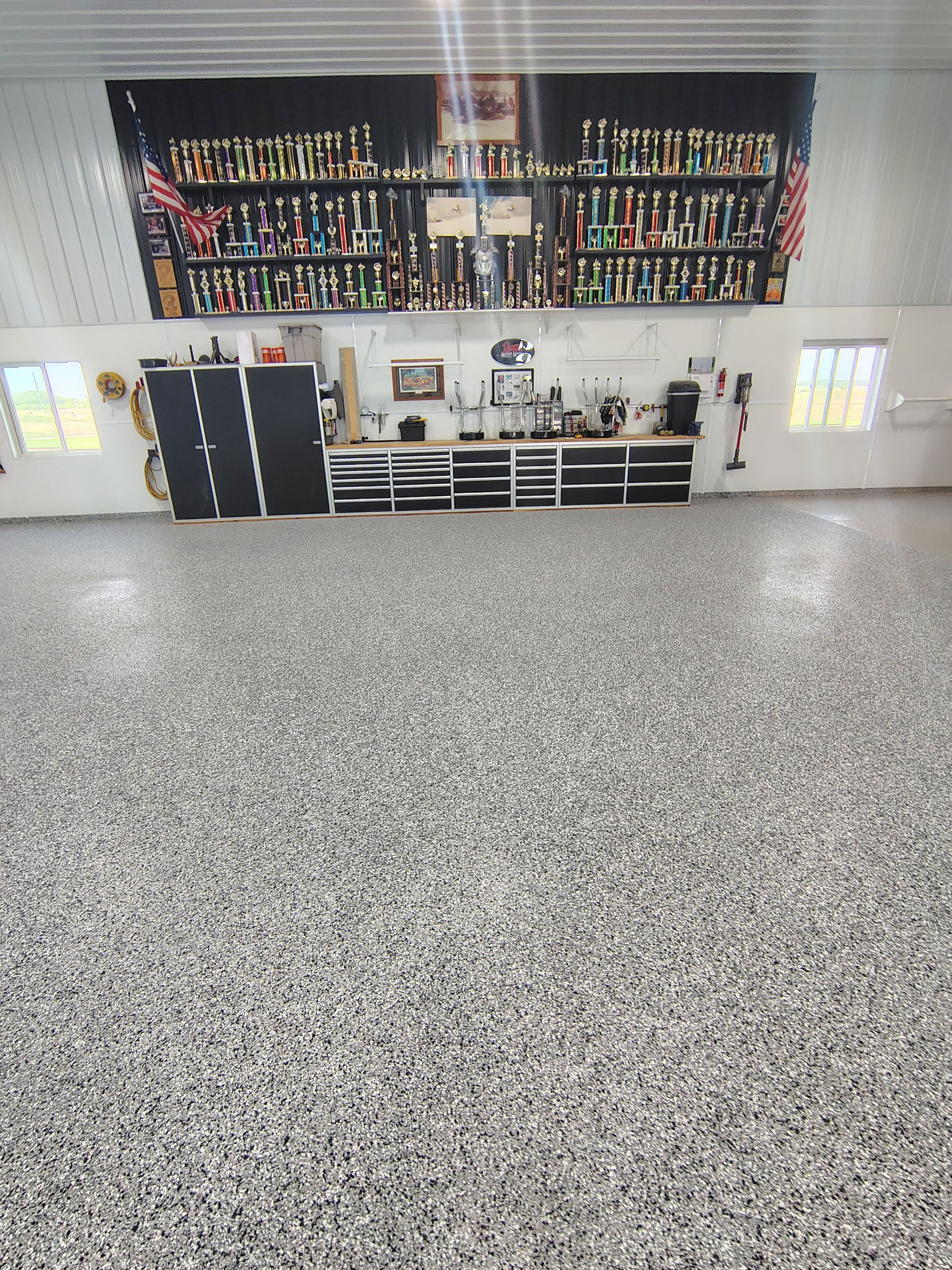Multi-Stage Concrete Floor Coating for Egan Shop and RV Storage by Select Painting, Coatings & Garage Cabinets