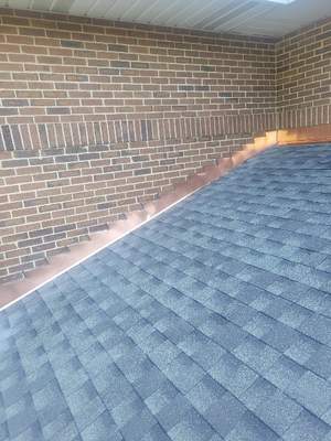 Asphalt Roof Replacement and Aluminum Gutter Installation
