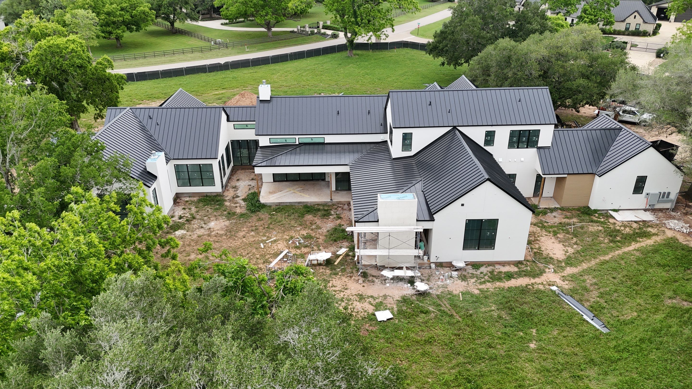 Matte Black Metal Roof by Level 7 Companies