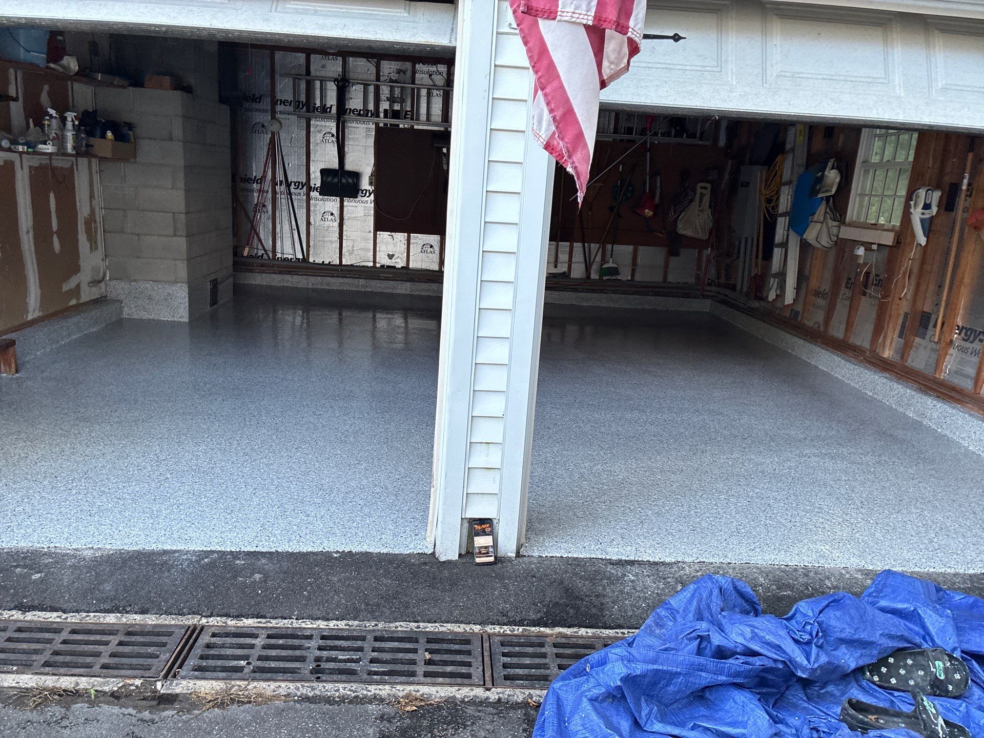 Concrete Floor Coating Using Feather Gray Color by DiGiorgi Roofing and Siding Inc