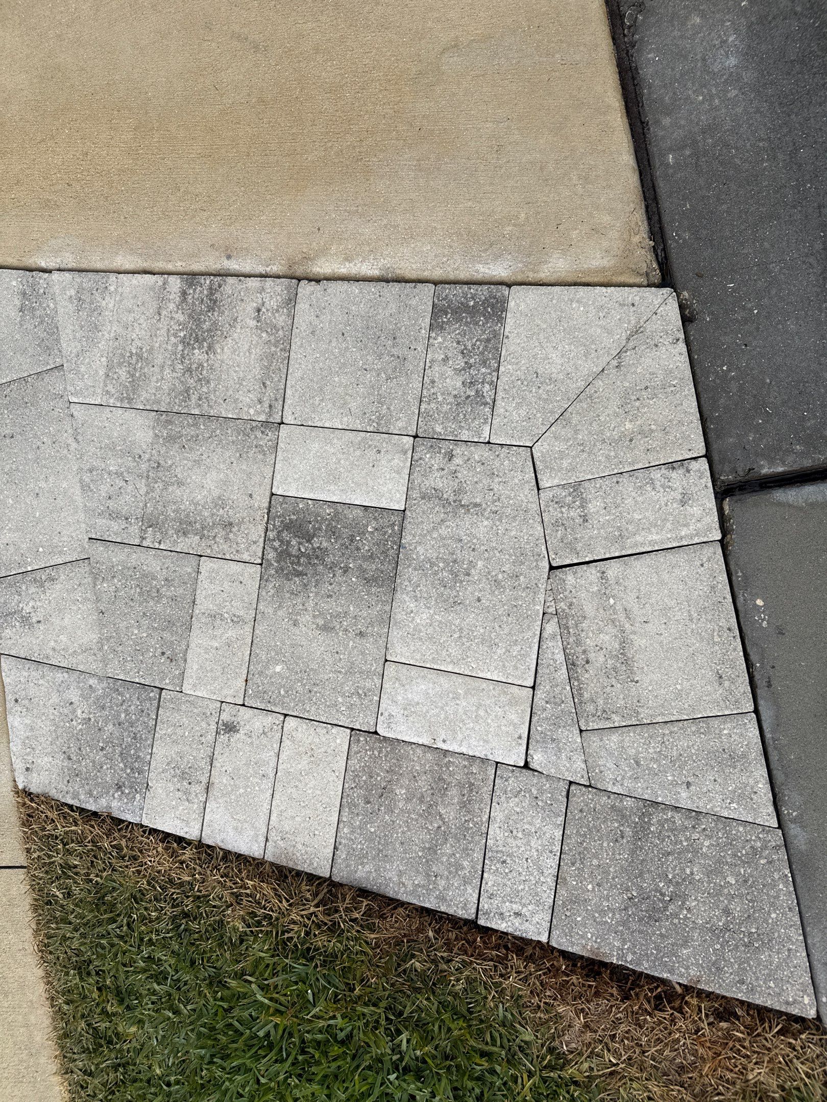 Rust Stain Removal from Concrete Driveway and Pavers in Park East at Azario | Lakewood Ranch, FL by Sunshine AquaWash
