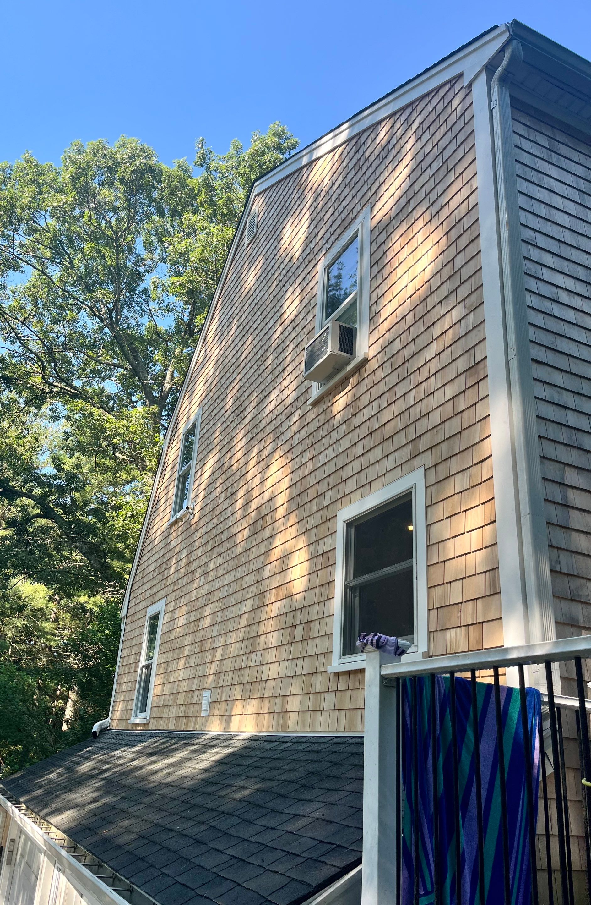 Partial residing project with Red Cedar shingles in Duxbury, MA by UBrothers Construction