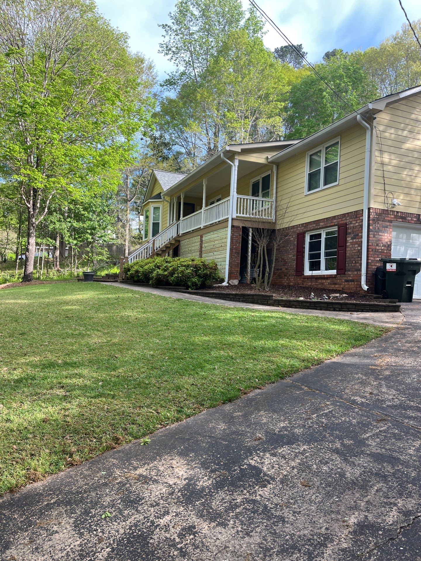Window, Siding, & Rotten Wood Replacement with Exterior Painting in Woodstock, GA by Nelson Exteriors 
