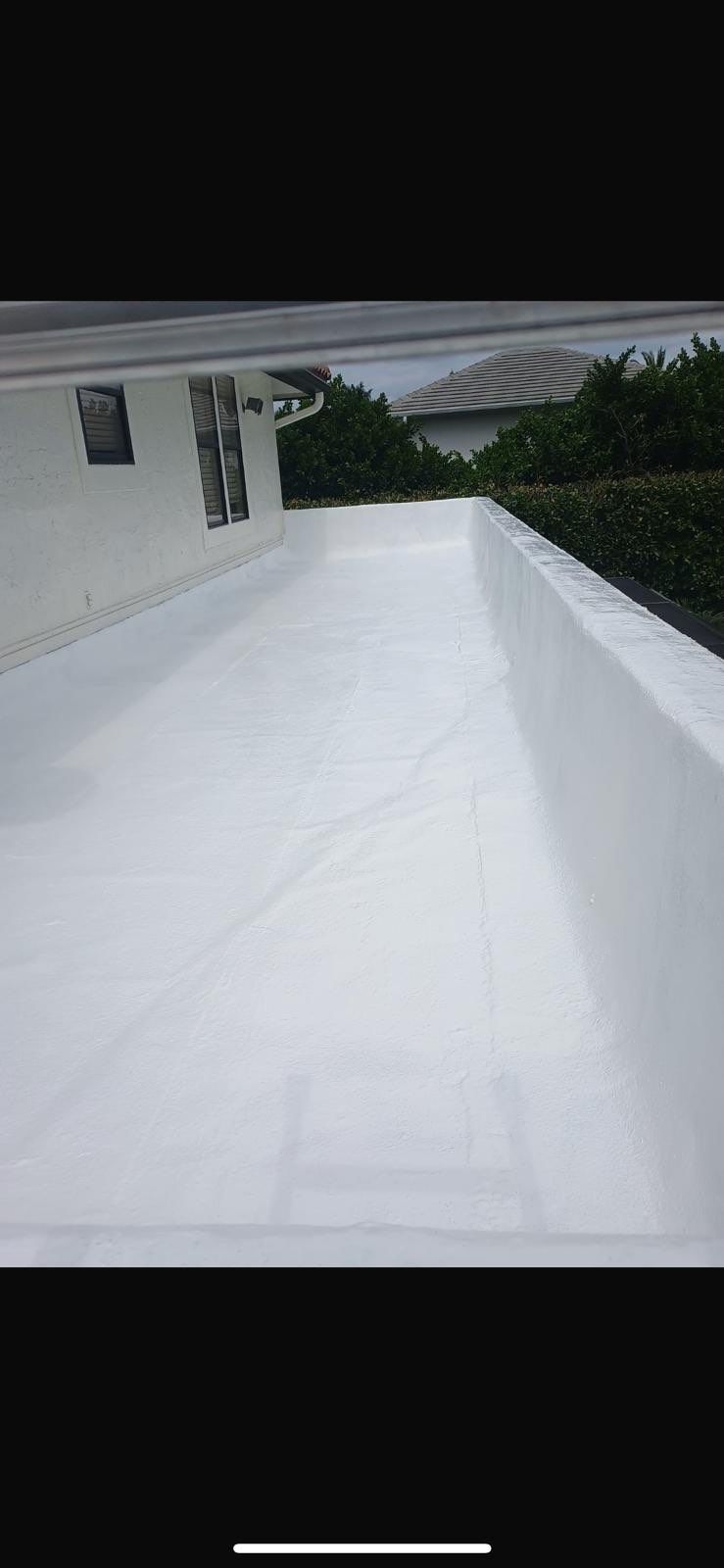 Residential Roofing Installation using Polybrite 90.1 silicone coating by BLUES BROTHERS CONSTRUCTION CORP