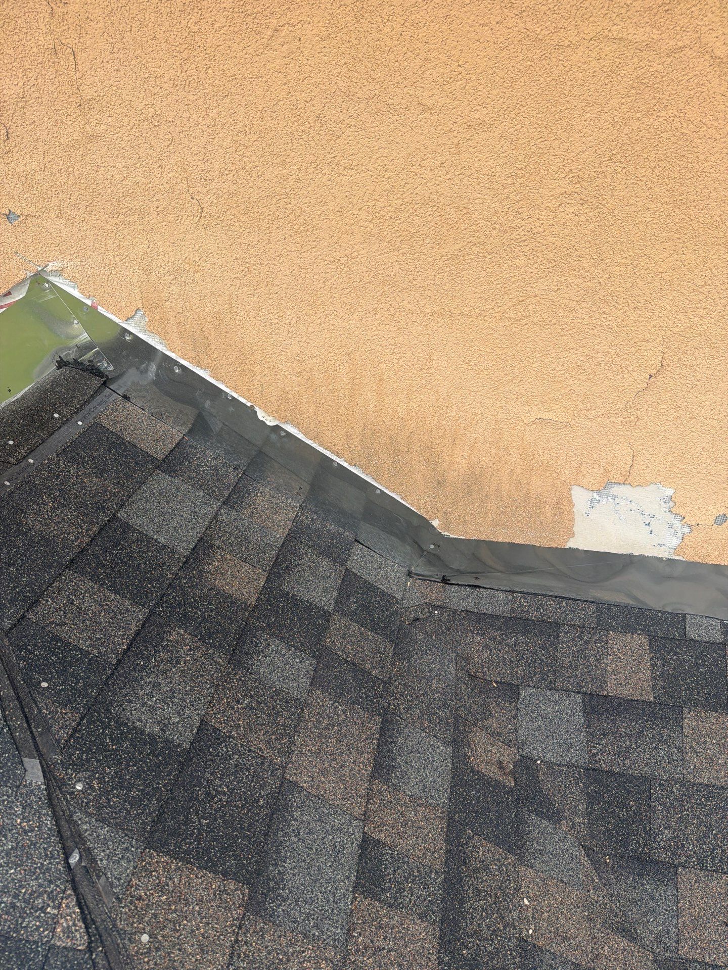 Flashing Stucco above the Roof by Bayfront Roofing and Construction