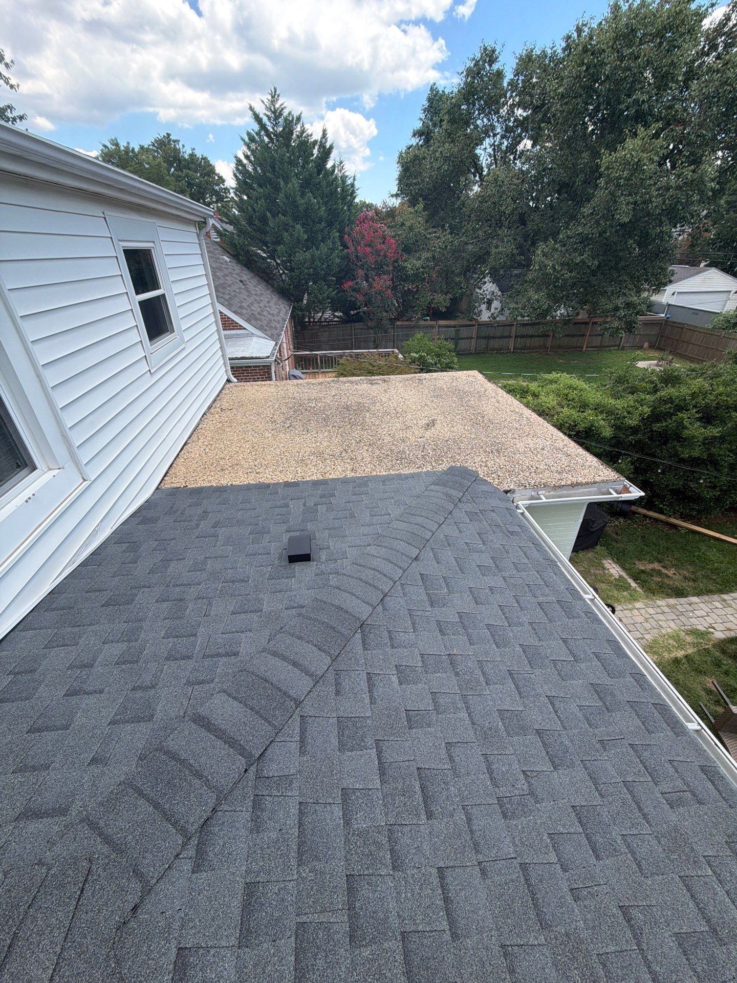 Richmond Roof Replacement Including Flat Membrane and Asphalt Shingles by Cade Construction