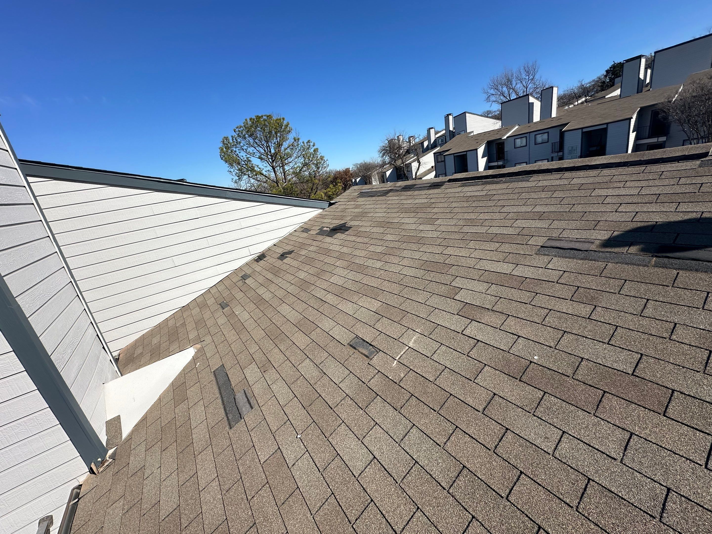 Apartment Roofing Repairs using Certainteed xt25 by Becker Roofing and Exteriors