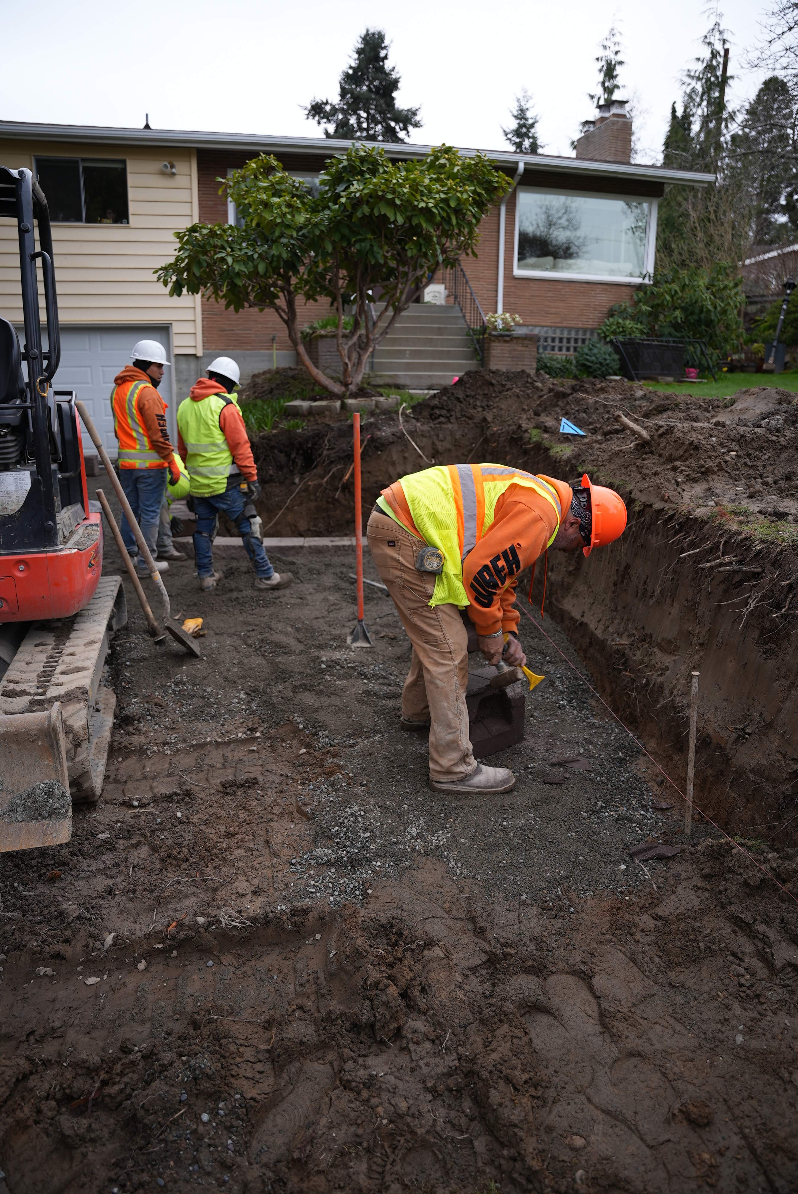 Lorra | Asphalt Driveway Repair & Retaining Wall by Jireh Asphalt & Concrete Inc 