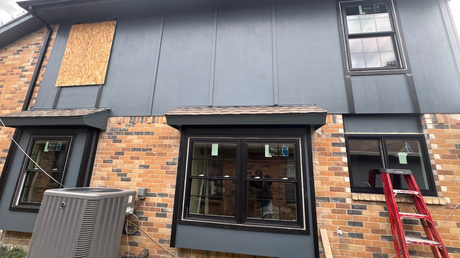 Windows and Exterior Paint by Rhino Roofing and General Contracting, LLC
