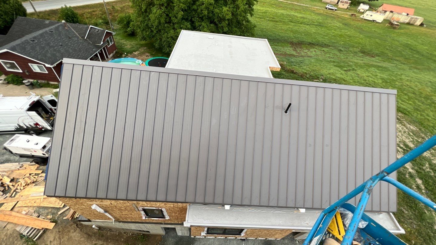 Residential Roofing Installation using multiple products by Top Notch Roofing Inc