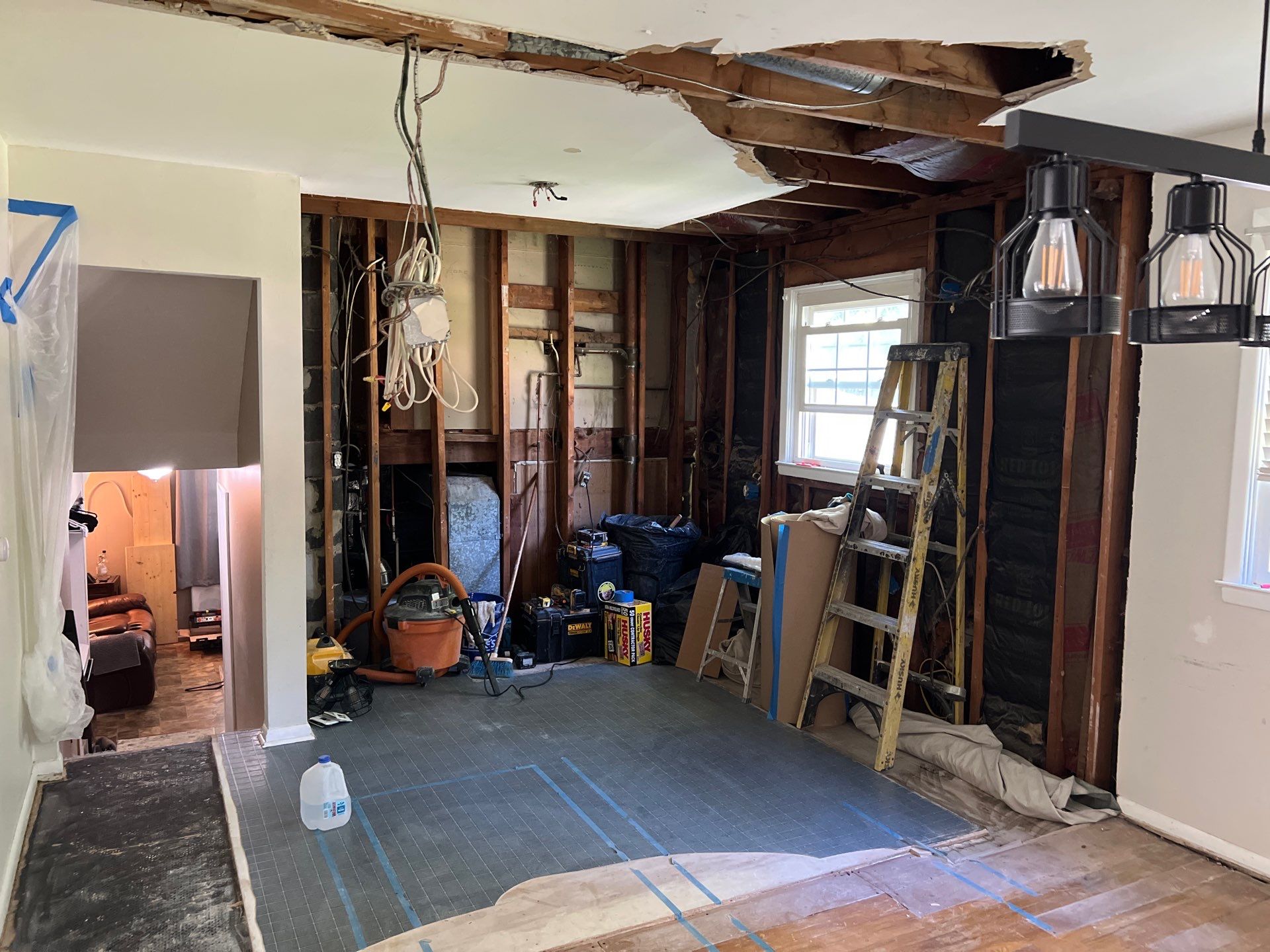 Phoenixville Kitchen Remodel with White Shaker Cabinets and Green Backsplash by Reliable General Contracting