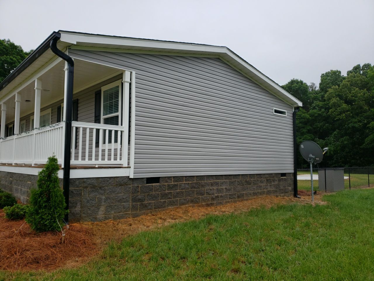 House Wash using cleaner by Power Wash Masters LLC