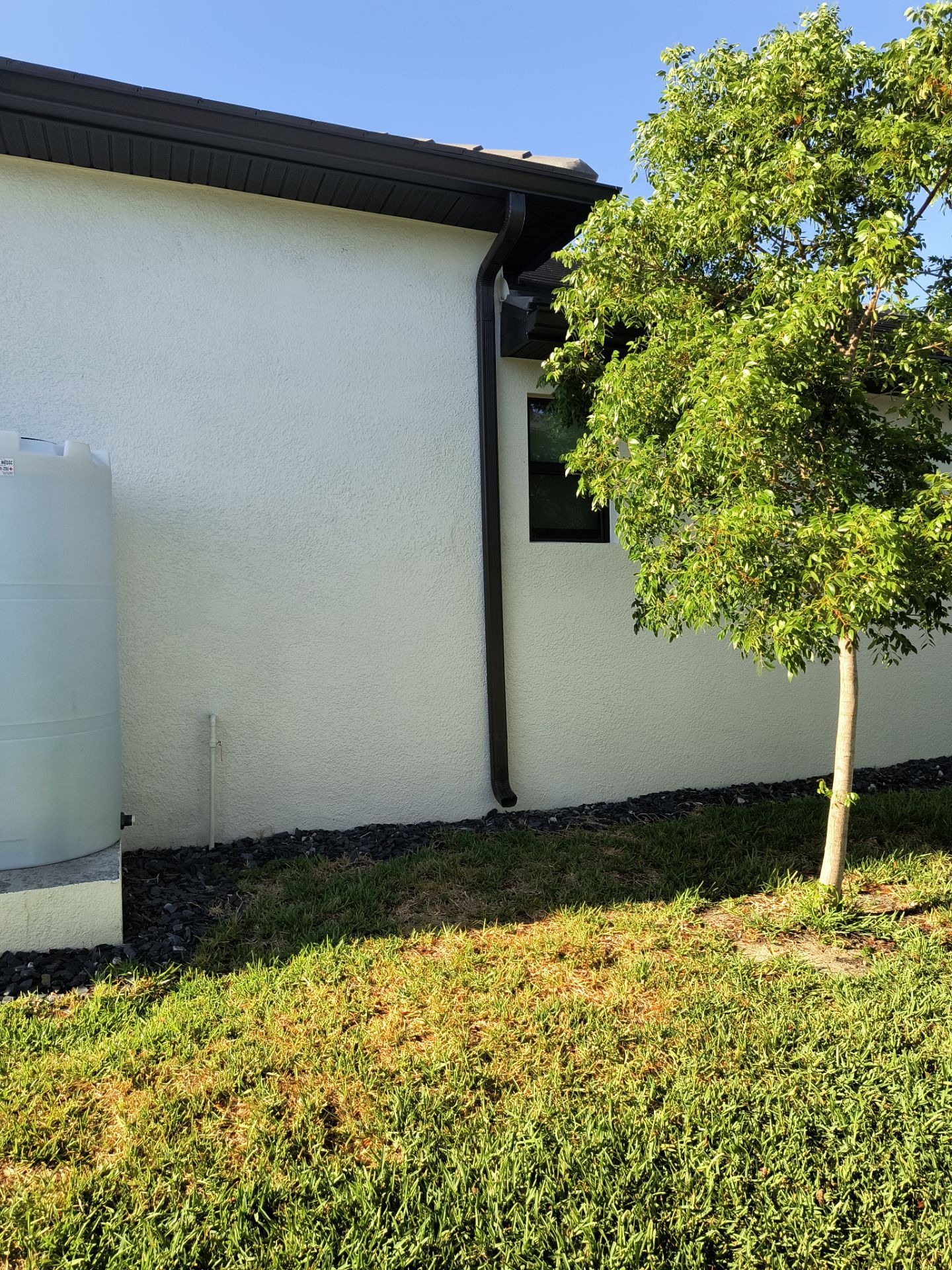 Dark Bronze 7-Inch Gutter Installation in Cape Coral FL by Gutter Professors