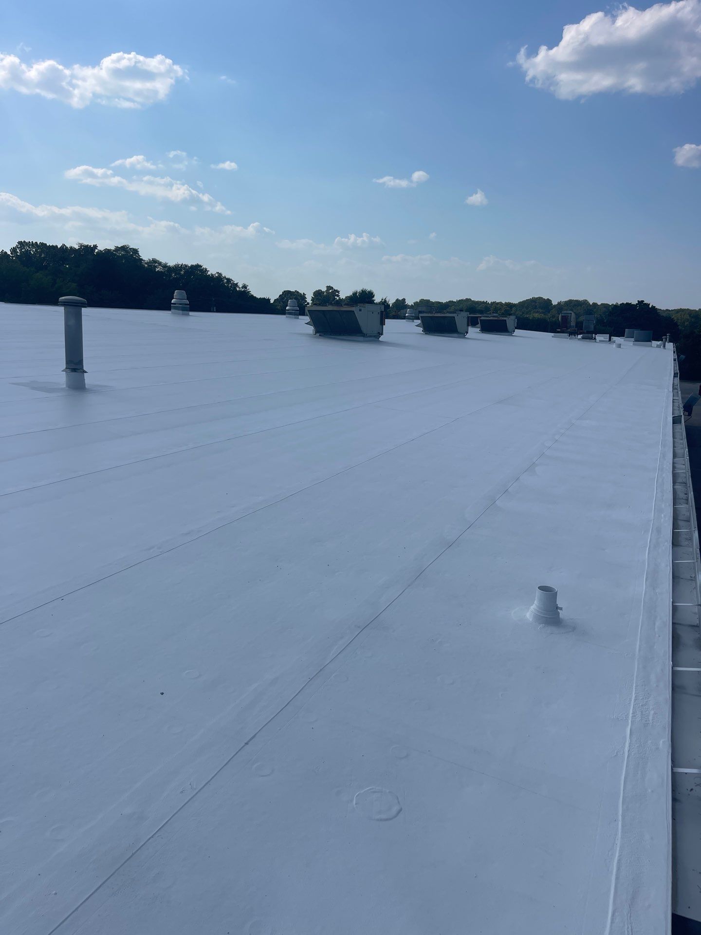 Commercial Roofing Installation using Coatings by Kentucky Commercial Roofing