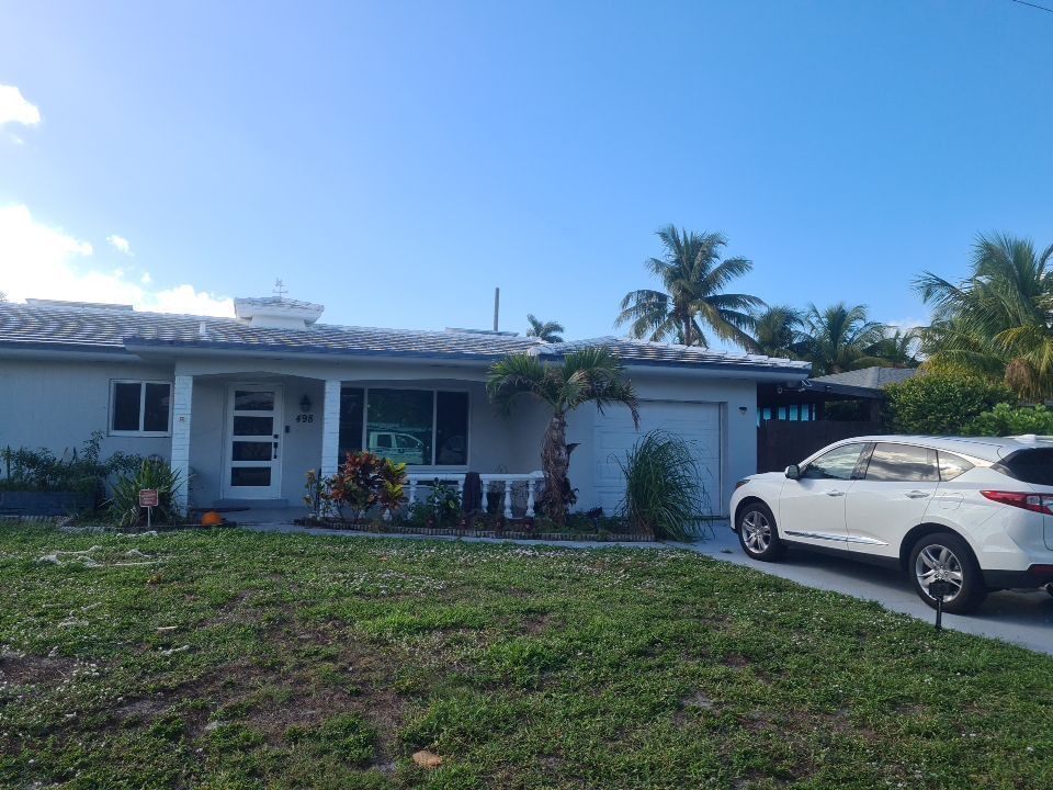 Residential Roofing Installation using 1" Nail strip metal roof by BLUES BROTHERS CONSTRUCTION CORP