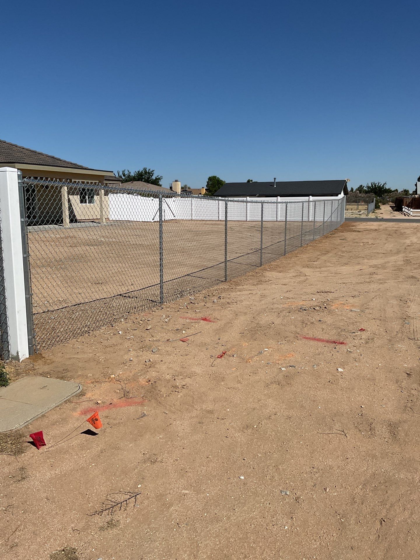 6ft White Privacy Vinyl Fence with Chain-link Fence by Fence Guys Inc.