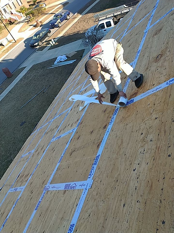 Residential Roofing Installation using Roof Replacement by American Roofing & Construction LLC