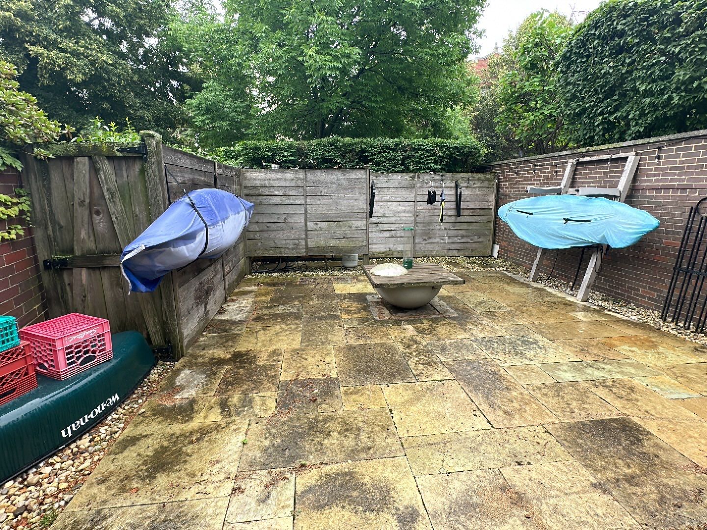 Aggregate and natural stone patio cleaning by Northern Power Washing LLC.