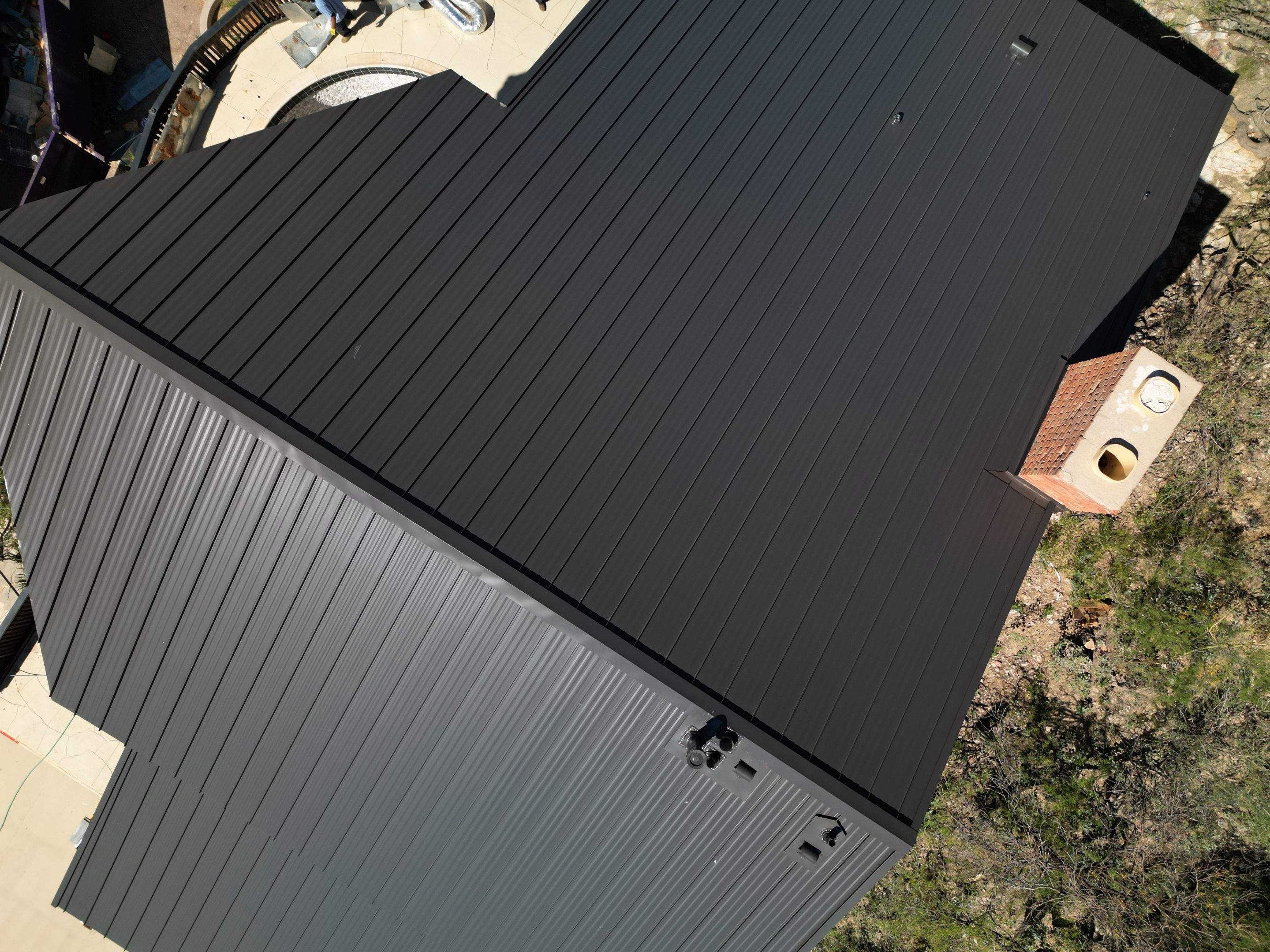 Burnished Slate Standing Seam by Reimagine Roofing