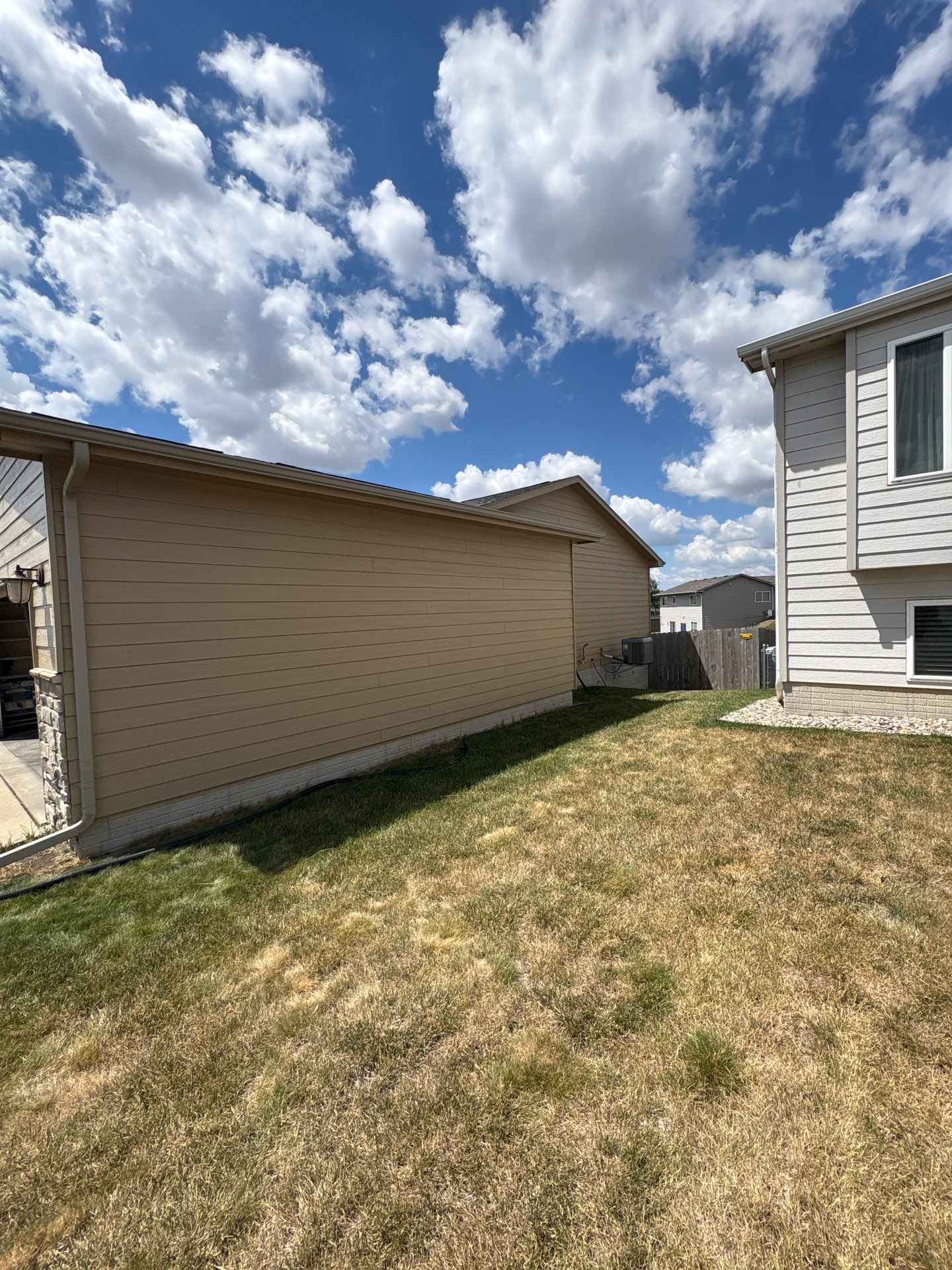 Exterior Painting and Custom Deck Construction in Sioux Falls by Select Painting, Coatings & Garage Cabinets